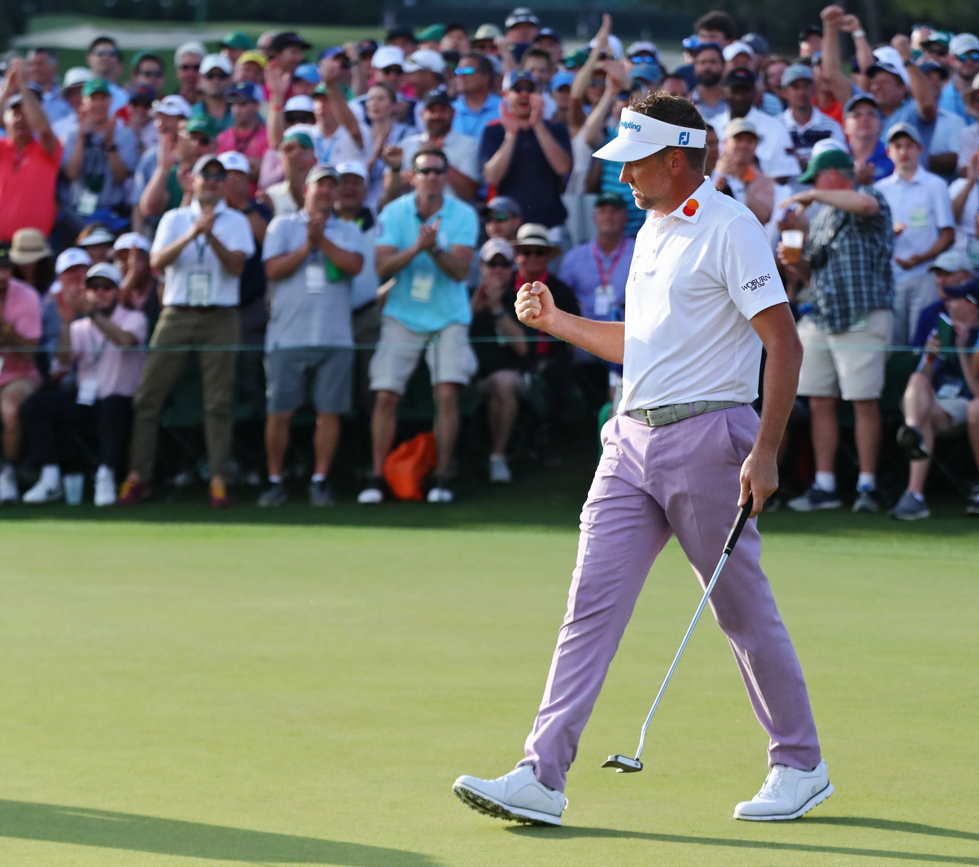 April 13, 2019 - Augusta - Ian Poulter reacts to his birdie on 18 during the third round of the Masters Tournament Saturday, April 13, 2019, at Augusta National Golf Club in Augusta. Curtis Compton / ccompton@ajc.com