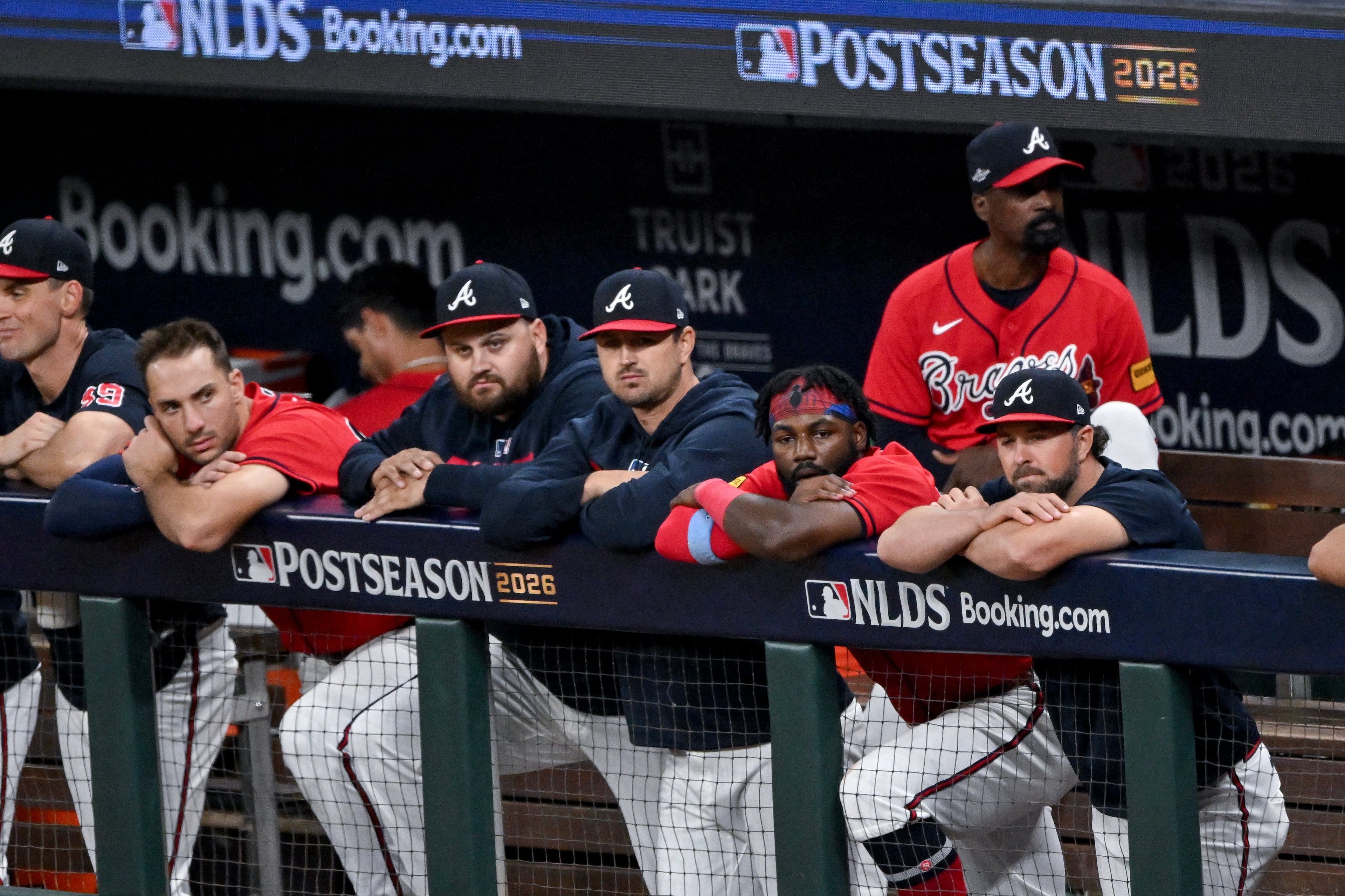 The Atlanta Braves watch from the dugout against the Los Angeles Dodgers during the ninth inning of Game 3 of the MLB National League Division Series between the Atlanta Braves and the Los Angeles Dodgers, Tuesday, Oct. 6, 2026, in Atlanta. (Hyosub Shin/AJC)
