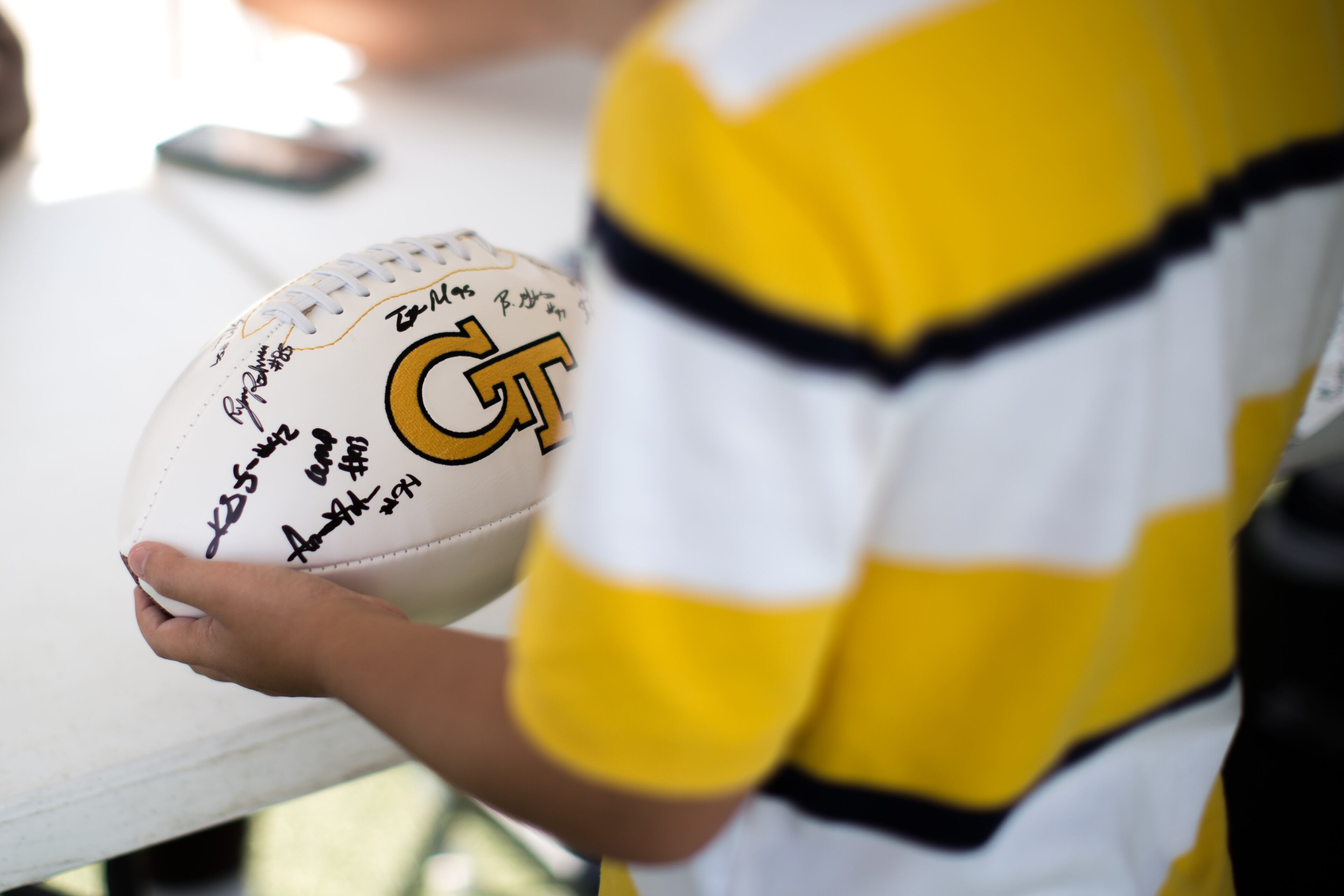Beauman Ivester waits to get his football autographed by Georgia Tech players during Georgia Tech football's annual fan day at Bobby Dodd Stadium, Saturday, August 8, 2015, in Atlanta. BRANDEN CAMP/SPECIAL