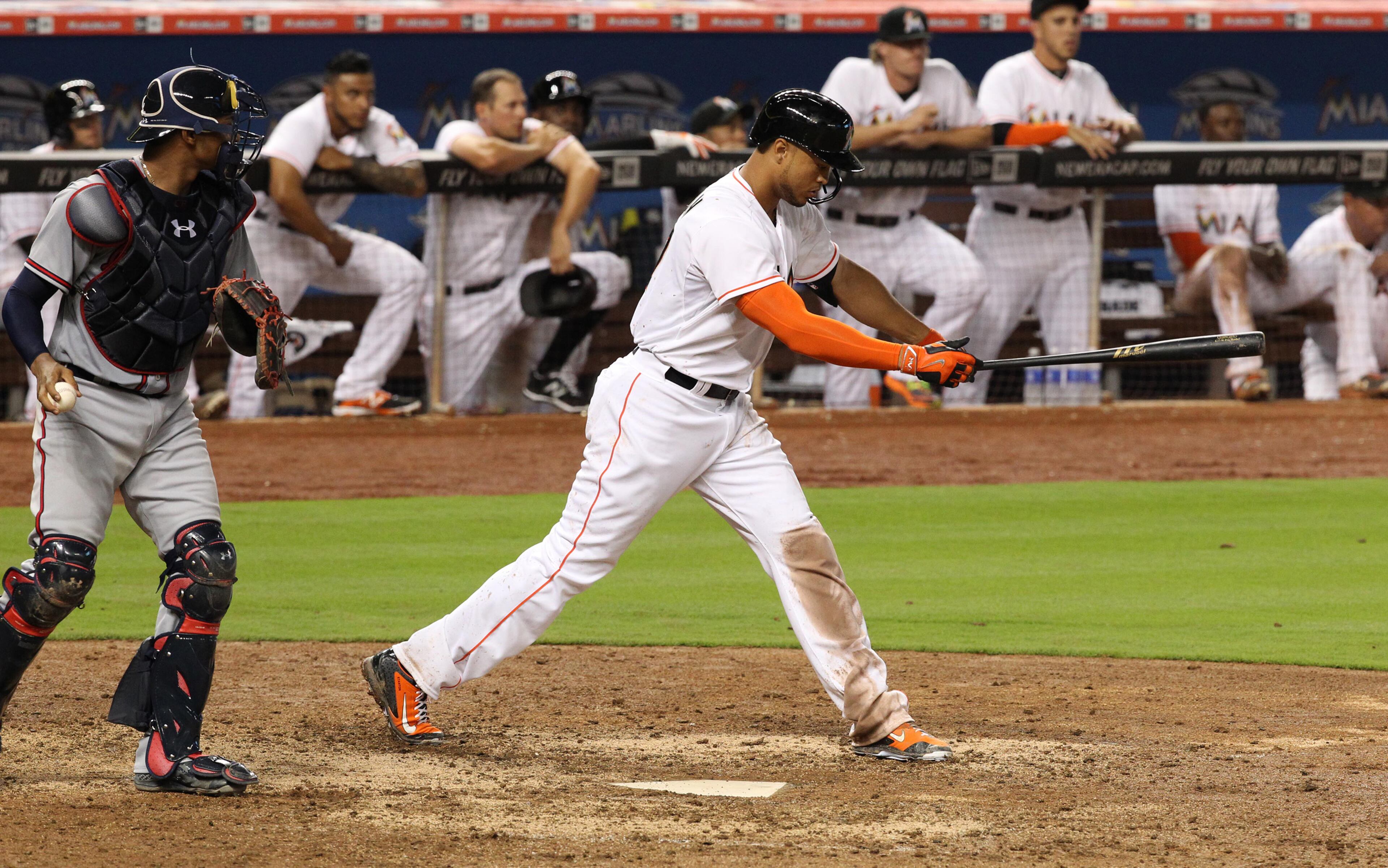 Miami Marlins' Giancarlo Stanton reacts after striking out during the ninth inning on Monday, April 6, 2015, at Marlins Park in Miami. (Hector Gabino/El Nuevo Herald/TNS)
