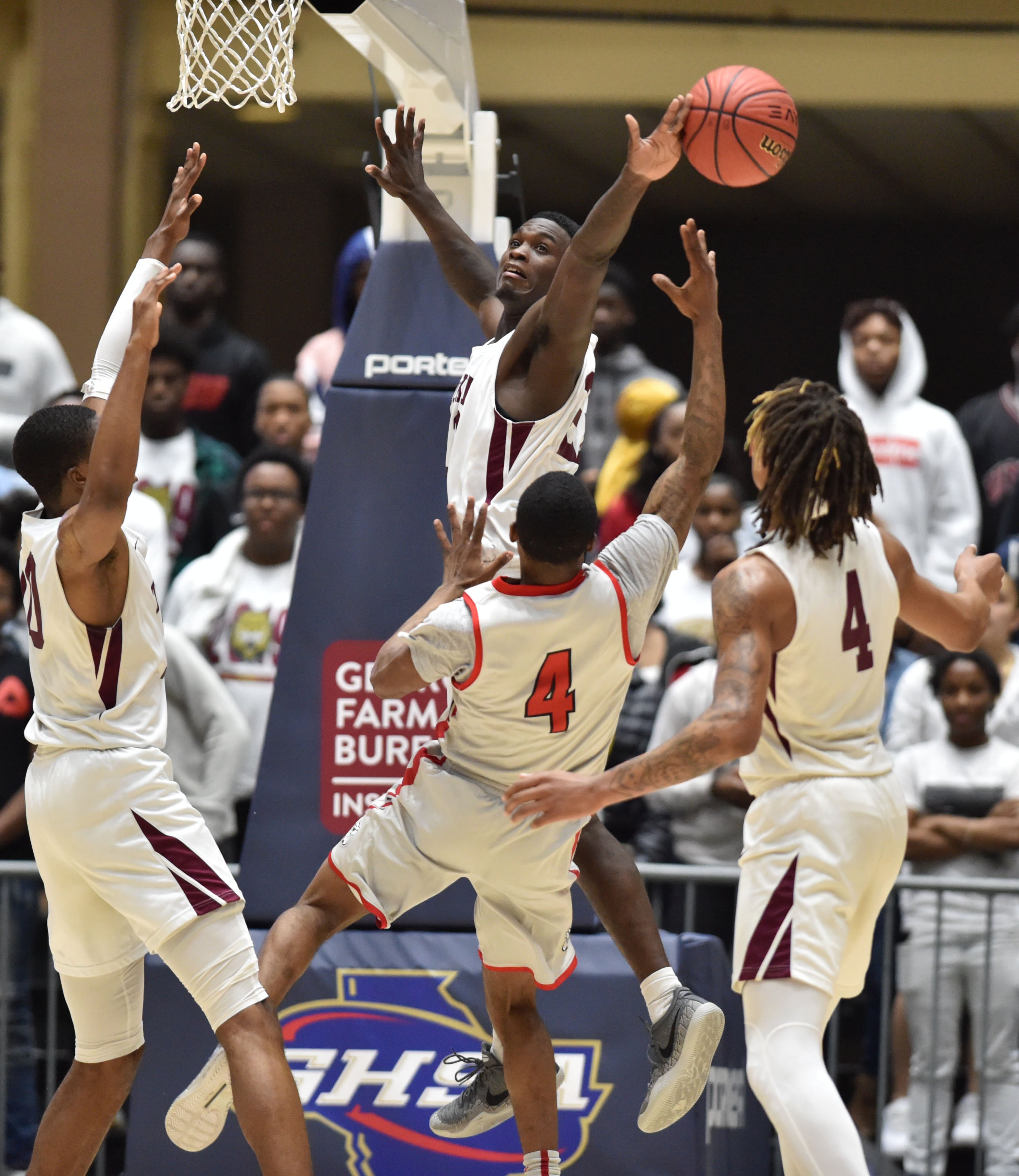 March 9, 2019 Macon - Tucker Torezz Alexander (23) blocks a shot by Tri-Cities Titus Hunter (4) in GHSA State Basketball Championship game at the Macon Centreplex in Macon on Saturday, March 9, 2019. HYOSUB SHIN / HSHIN@AJC.COM
