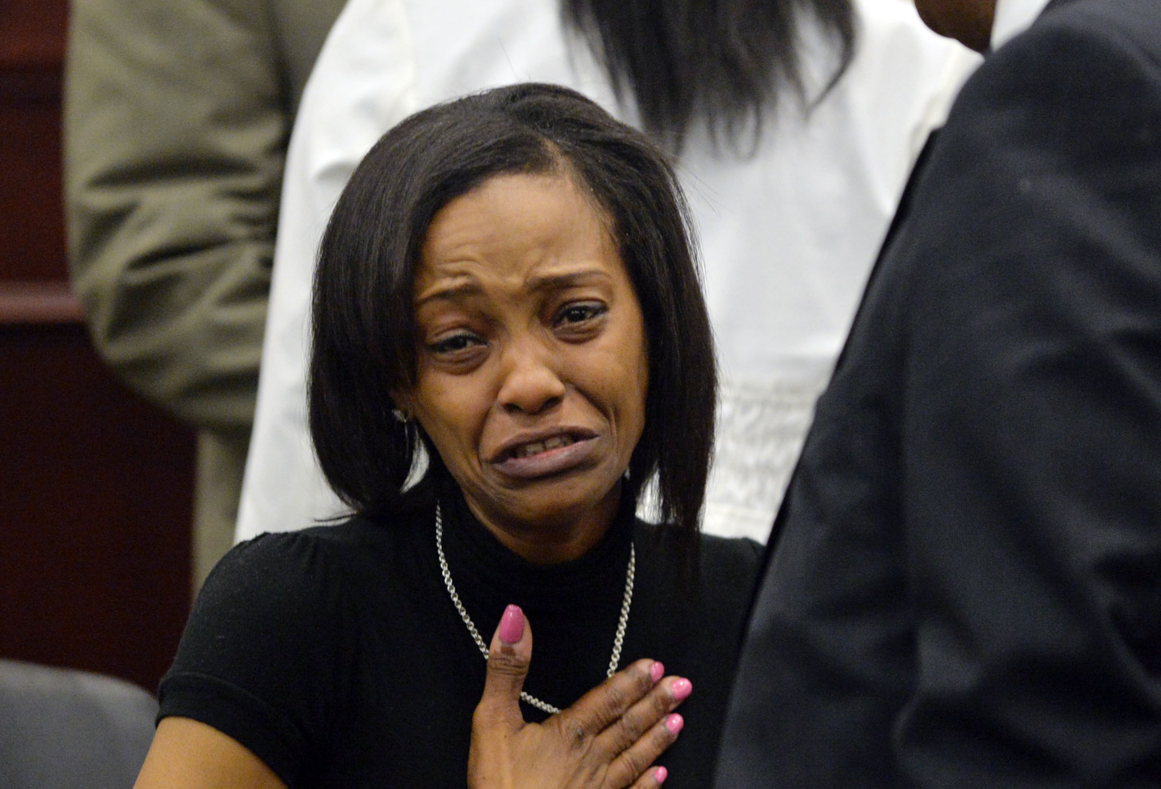 After sentencing, Judge Simmons gave Fallings and Hopkins 10 days more of freedom to afford them time to make arrangements, including finding care for Hopkins’ 2-year-old son. - Text by Rhonda Cook, AJC
