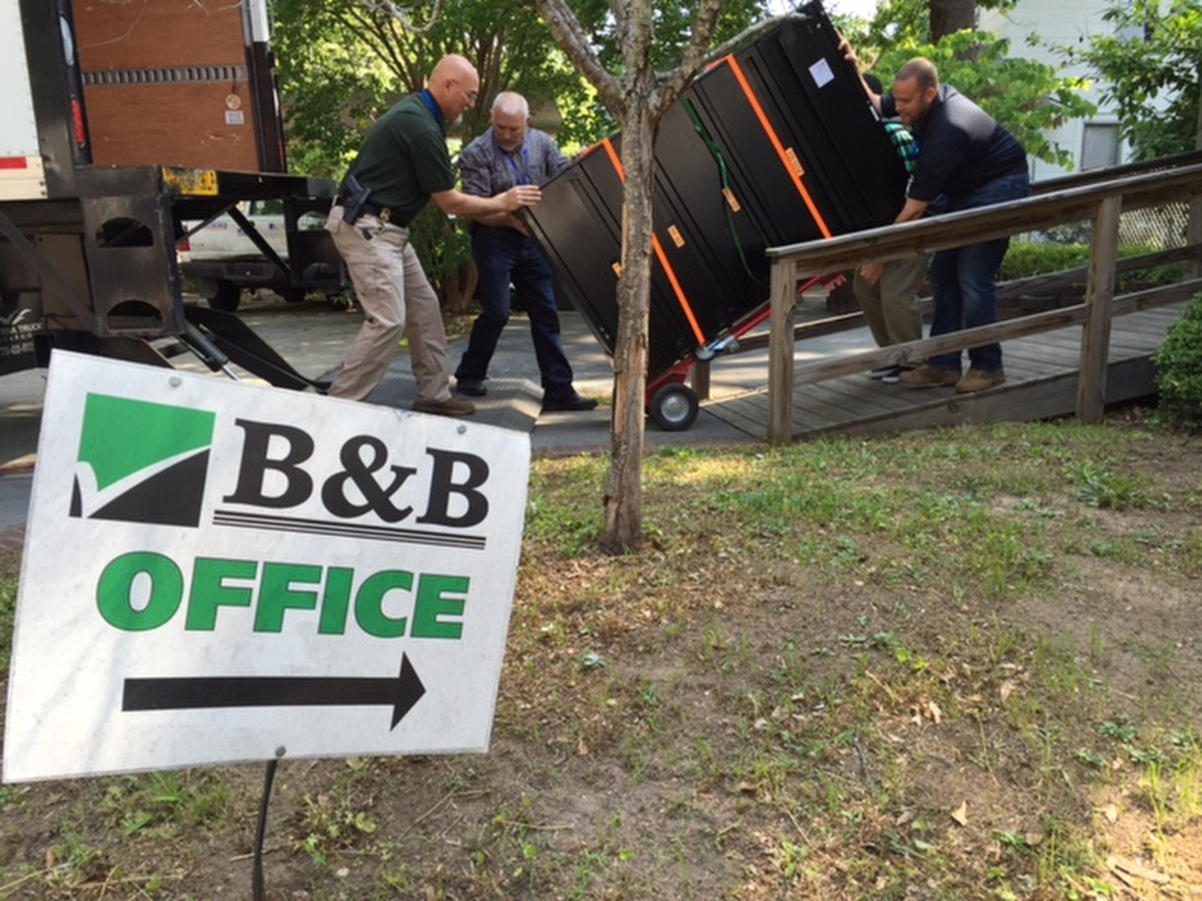 Georgia Department of Revenue agents haul away a file cabinet full of tax returns from B & B Accounting and Tax Services in Hapeville on May 6, 2016. The agency is investigating the business operated by Ruth Barr, a member of the Hapeville City Council. Read the story here: http://www.myajc.com/news/news/crime-law/hapeville-official-leaves-trail-of-fraud-allegatio/nrLFb/