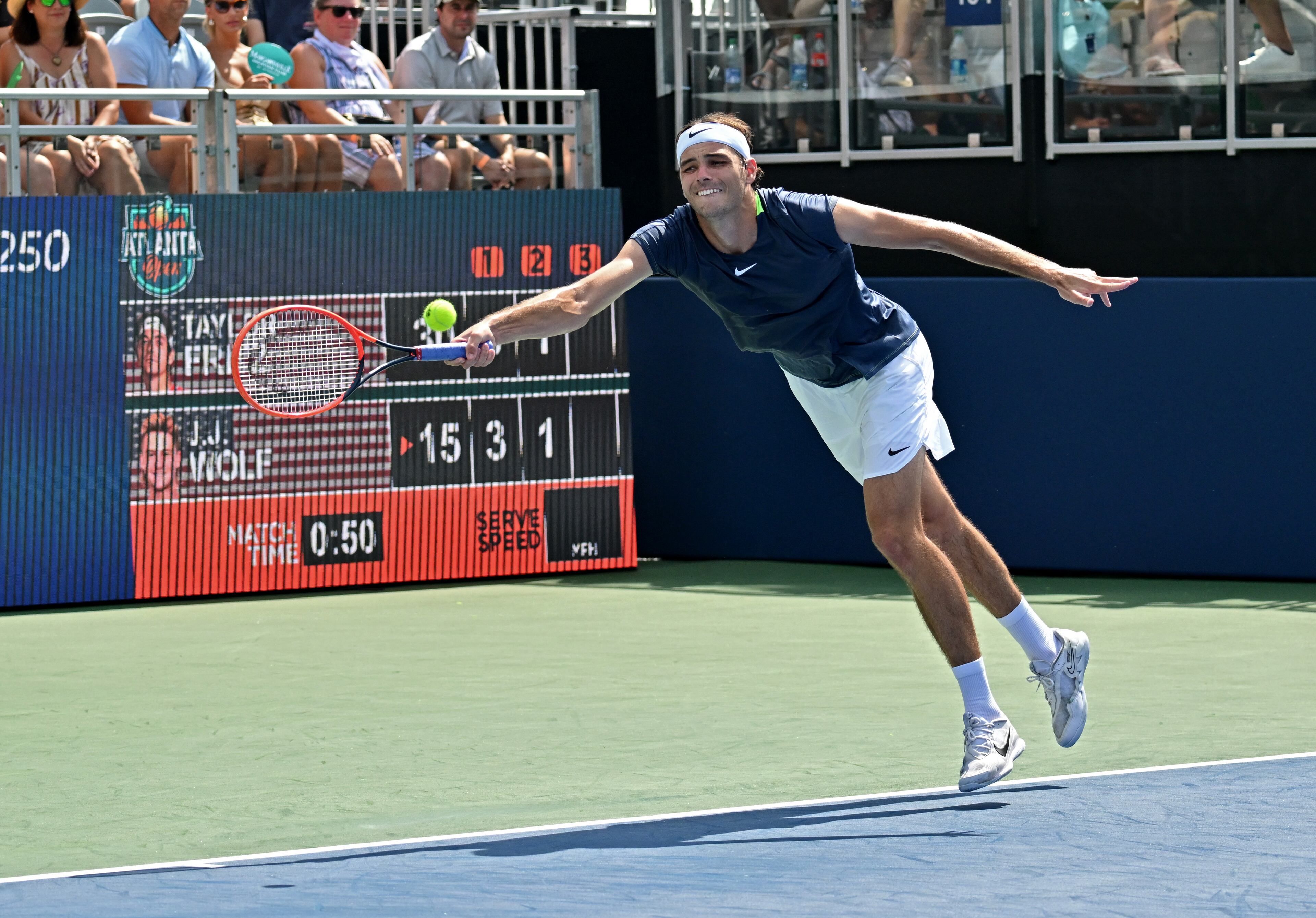 Taylor Fritz returns the ball to J.J. Wolf during a semifinal match at the 2023 Atlanta Tennis Open at Atlantic Station, Saturday, July 29, 2023, in Atlanta. (Hyosub Shin / Hyosub.Shin@ajc.com)