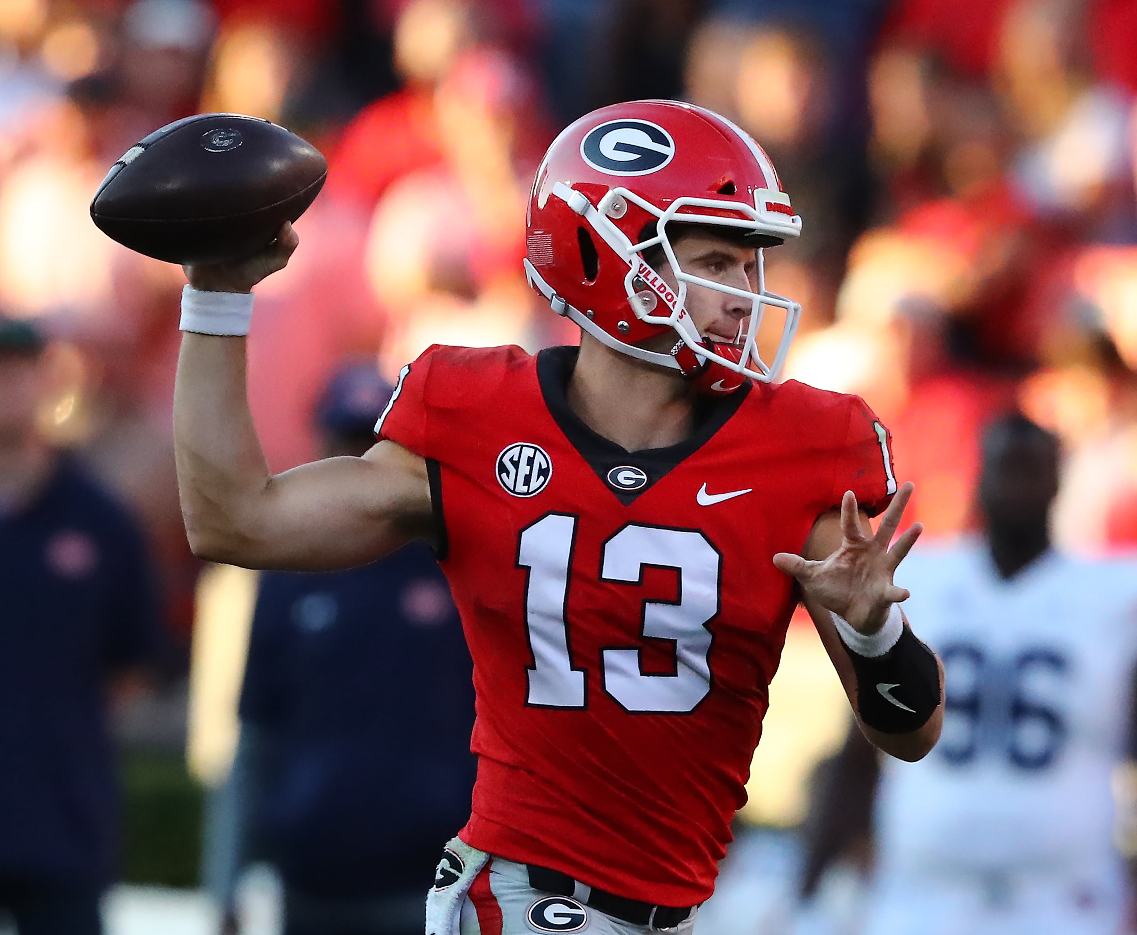 Georgia quarterback Stetson Bennett delivers a first-down pass against Auburn during the fourth quarter in a NCAA college football game on Saturday, Oct. 8, 2022, in Athens. Curtis Compton / Curtis Compton@ajc.com