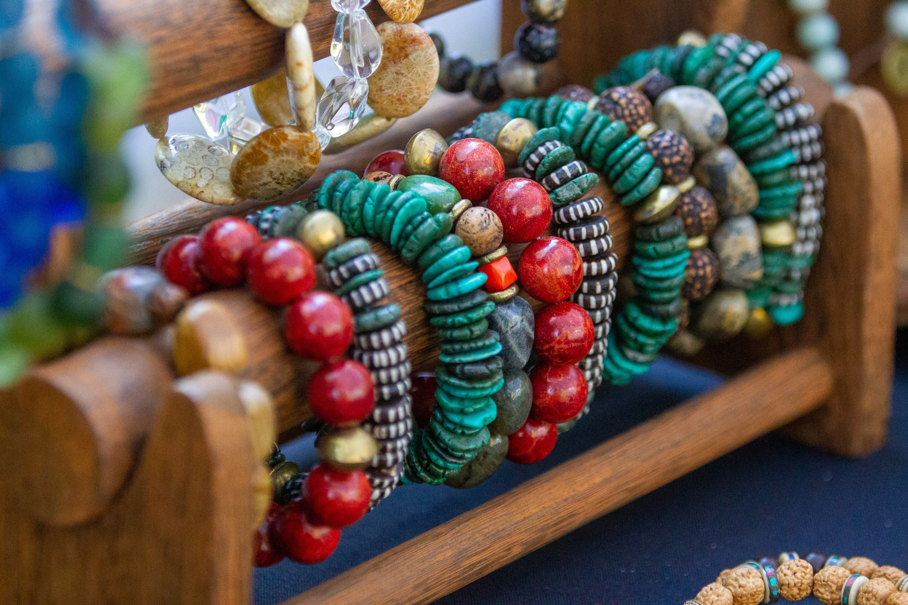 Stephanie Leigh's jewelry sits on display during the Chastain Park Fall Arts Festival on Sunday, November 7, 2021. STEVE SCHAEFER FOR THE ATLANTA JOURNAL-CONSTITUTION