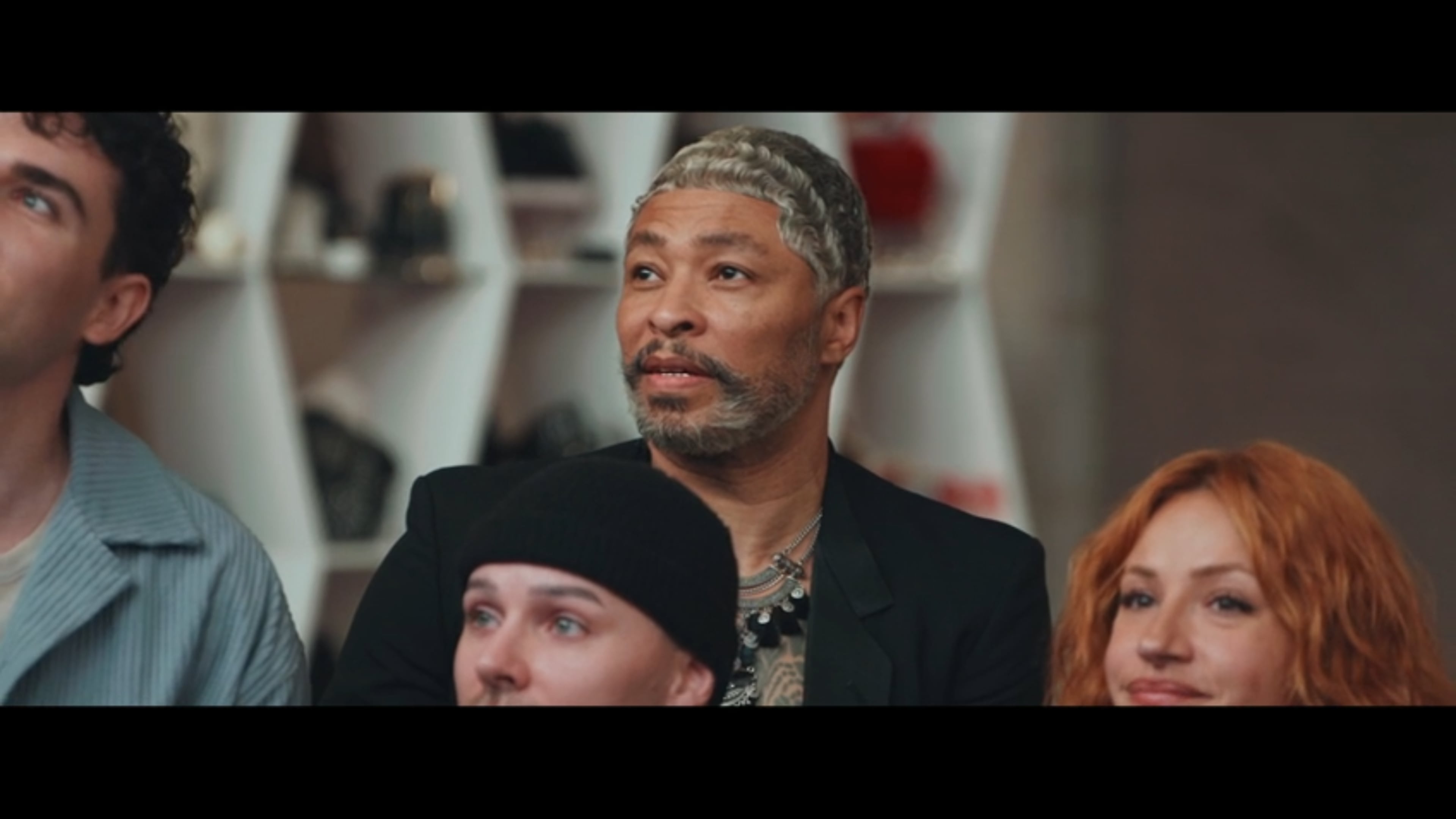 ATlanta resident Octavius Terry watches his model go down the runway during the first challenge of Season 22 of Freeform's "Project Runway." (Freeform/Disney+)