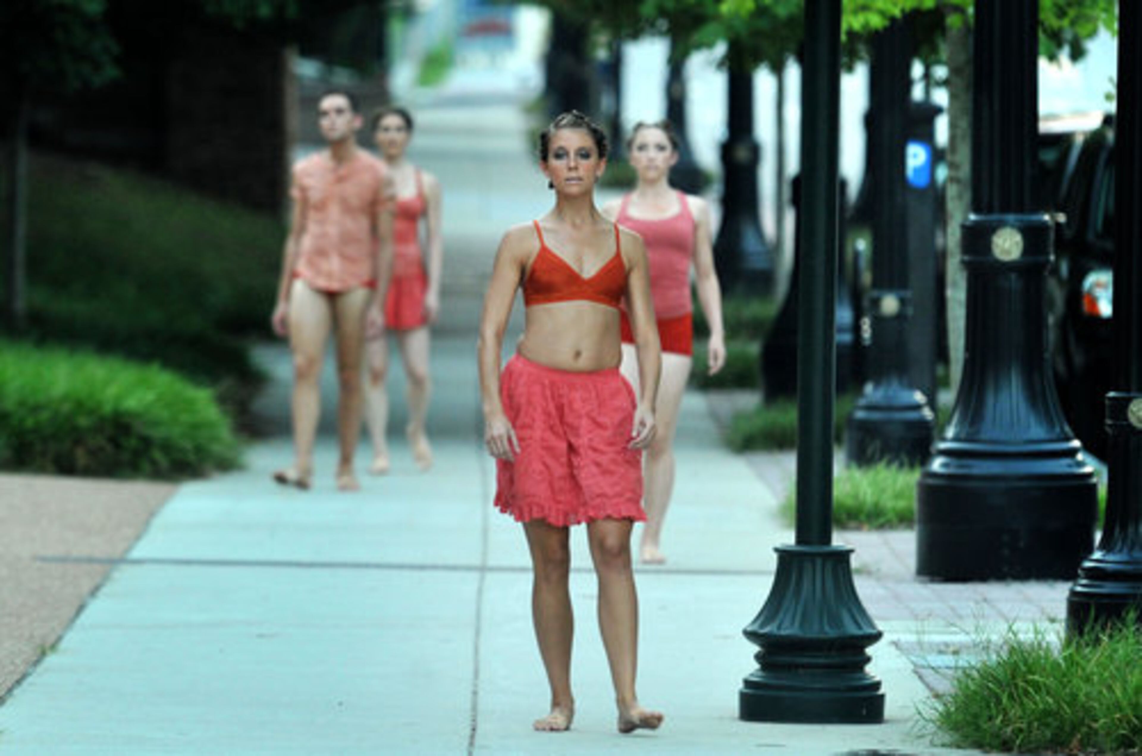 Artists perform on sidewalk of Peachtree Road during Roem.