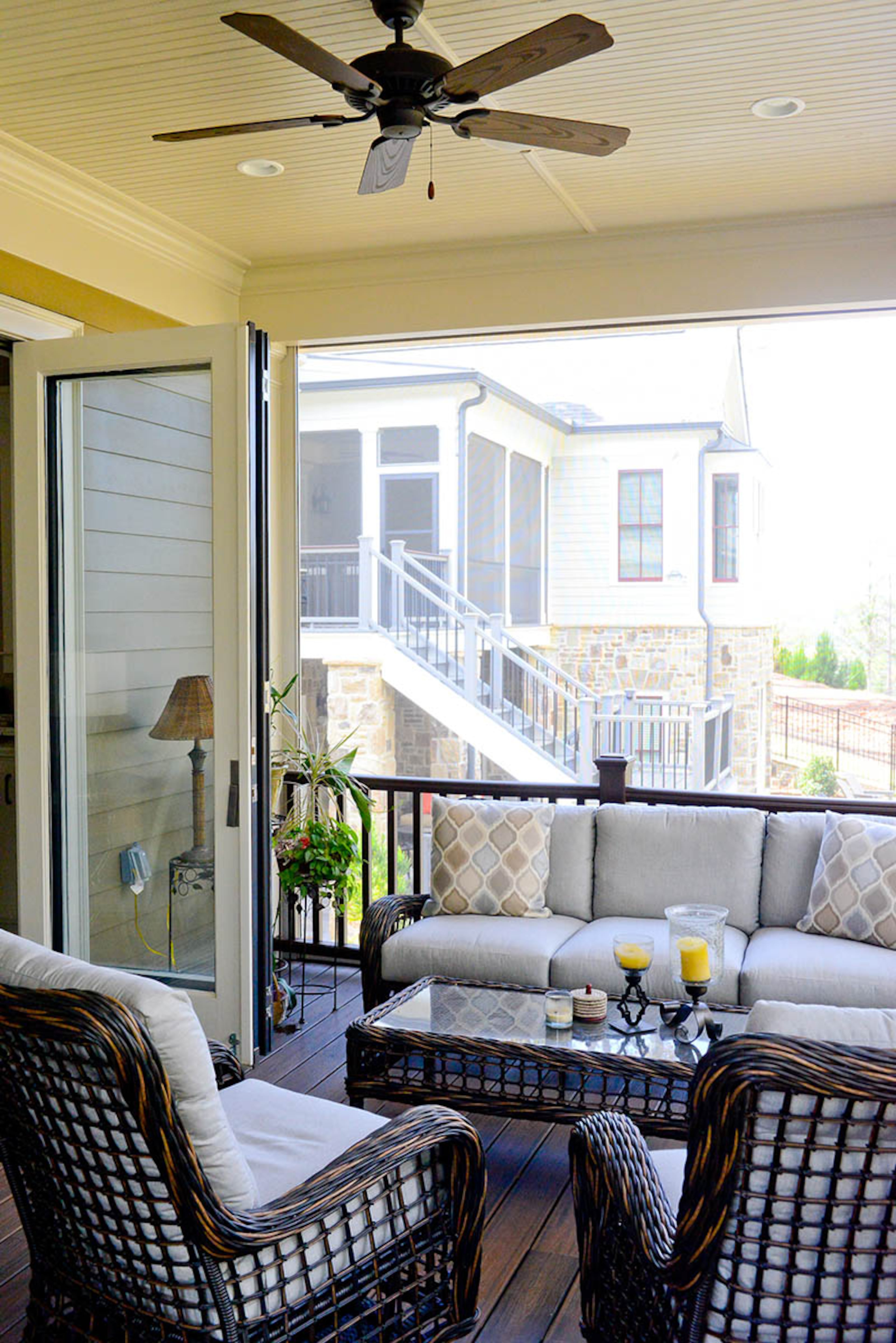 Wicker furniture is a staple for many Southern porches, decks and patios, including the Storeys'.
