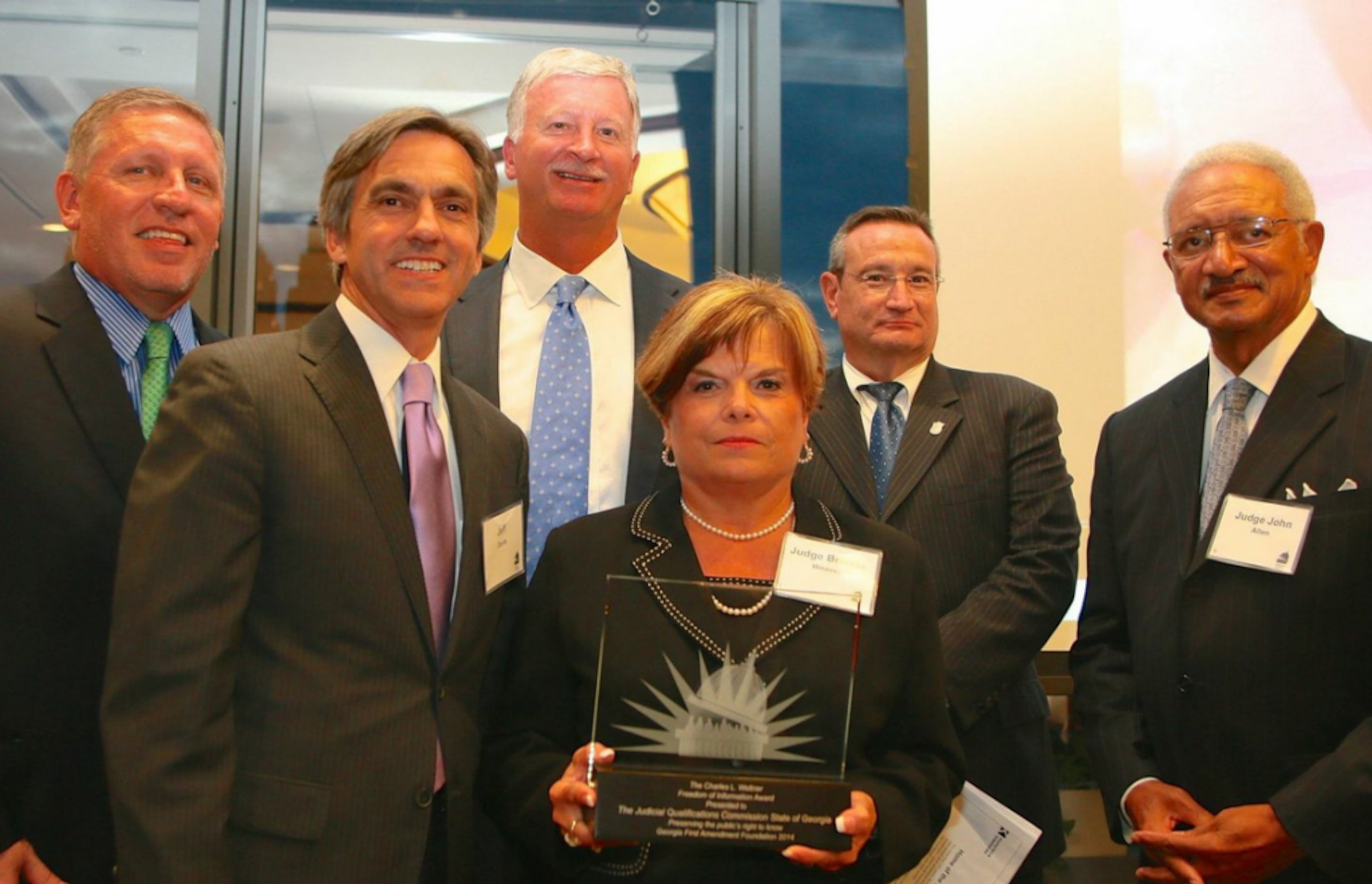 Current and former members of the Judicial Qualifications Commission accept the Georgia First Amendment Foundation’s 2014 Freedom of Information Award. From left are Lester Tate, Jeff Davis, Robert Ingram, Judge Brenda Weaver, Richard Hyde, Judge John Allen.