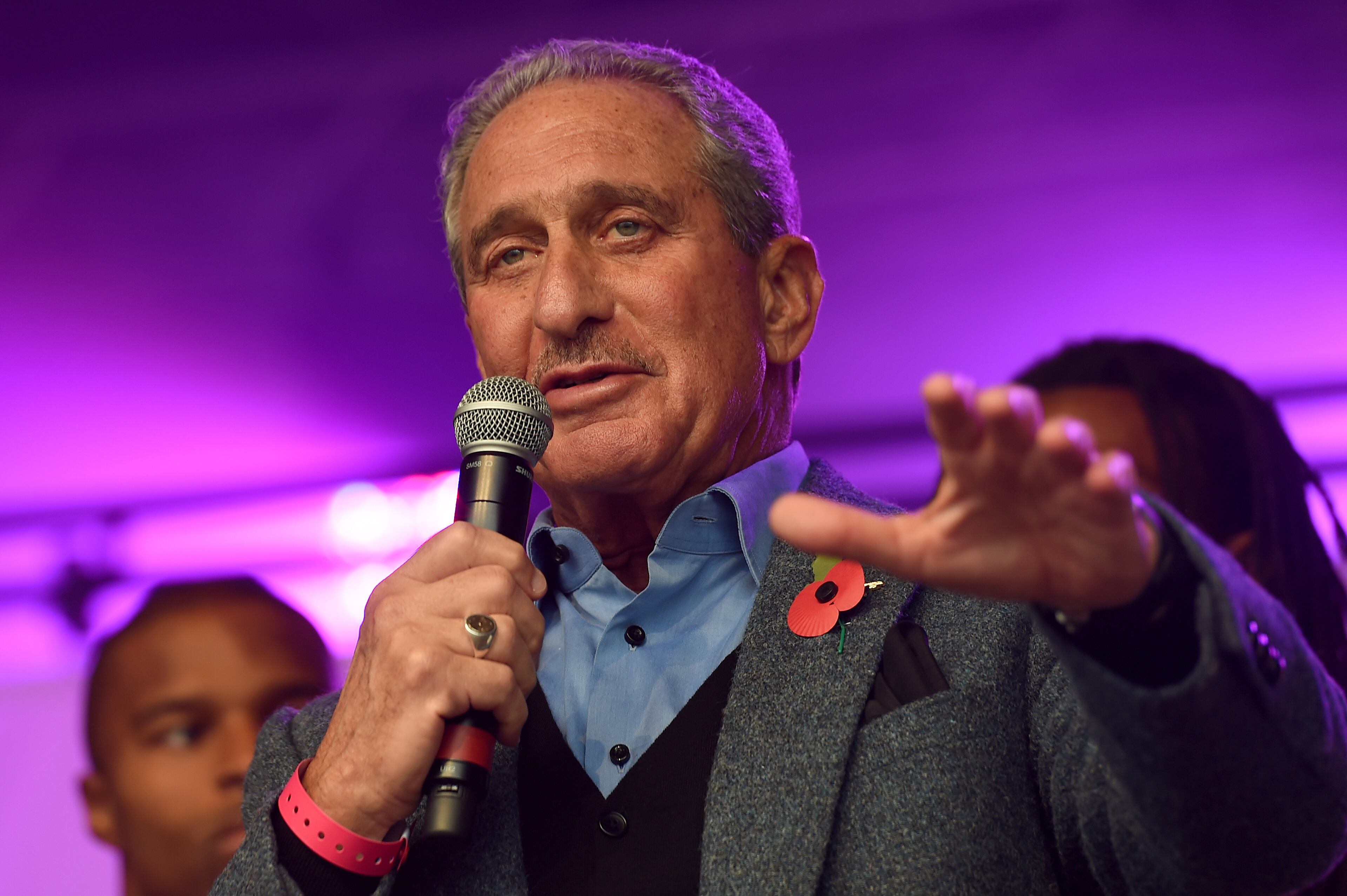 Atlanta Falcons owner Arthur Blank speaks on stage during the NFL Fan Rally in Trafalgar Square, London, England, Saturday, Oct. 25, 2014. The Atlanta Falcons will play the Detroit Lions in an NFL football game at London's Wembley Stadium on Sunday Oct. 26. (AP Photo/Tim Ireland)
