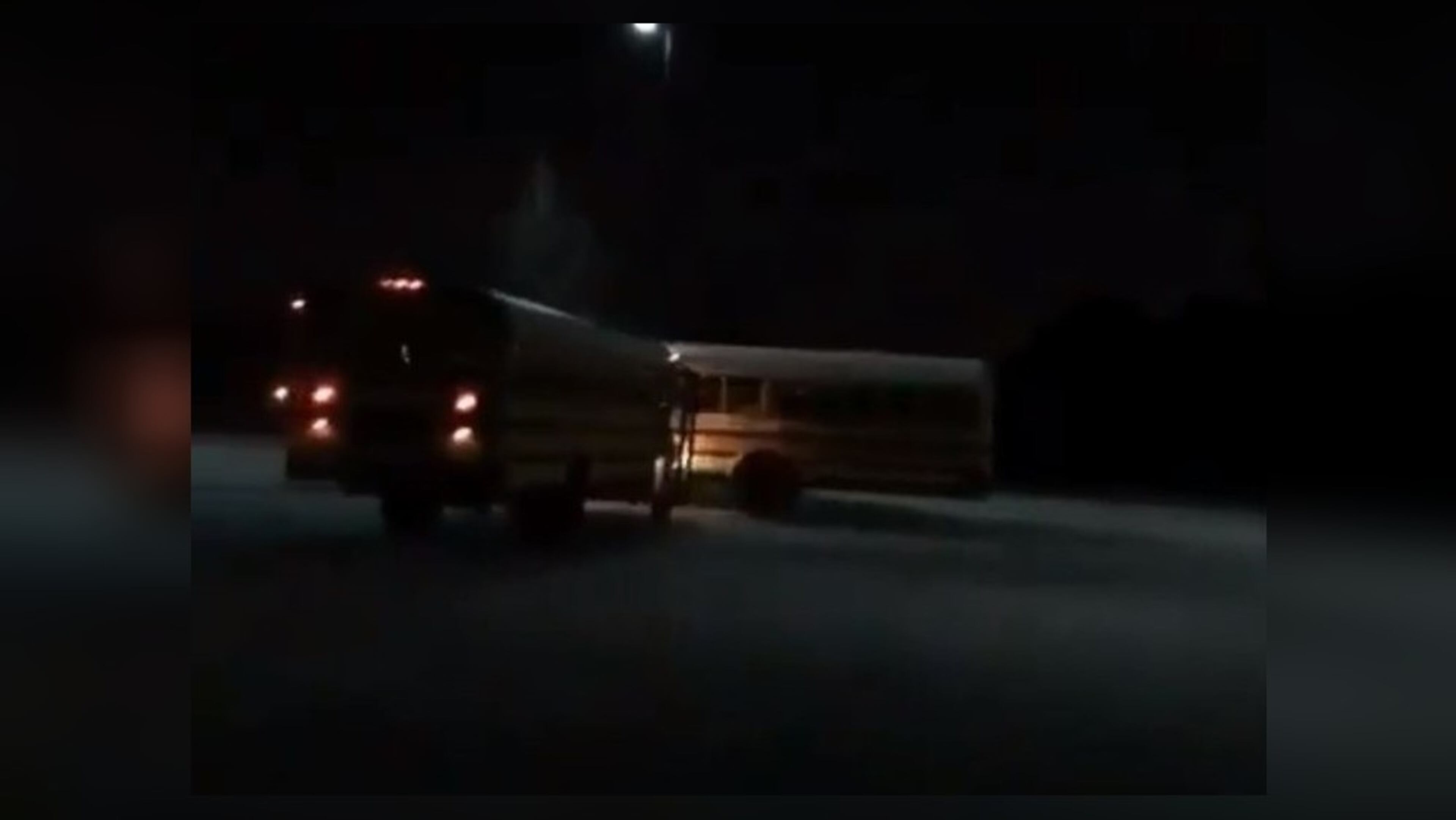 A video posted to Facebook shows a stolen school bus plow into another bus parked at Banneker High School on Sunday, Channel 2 Action News reported. (Credit: Facebook)