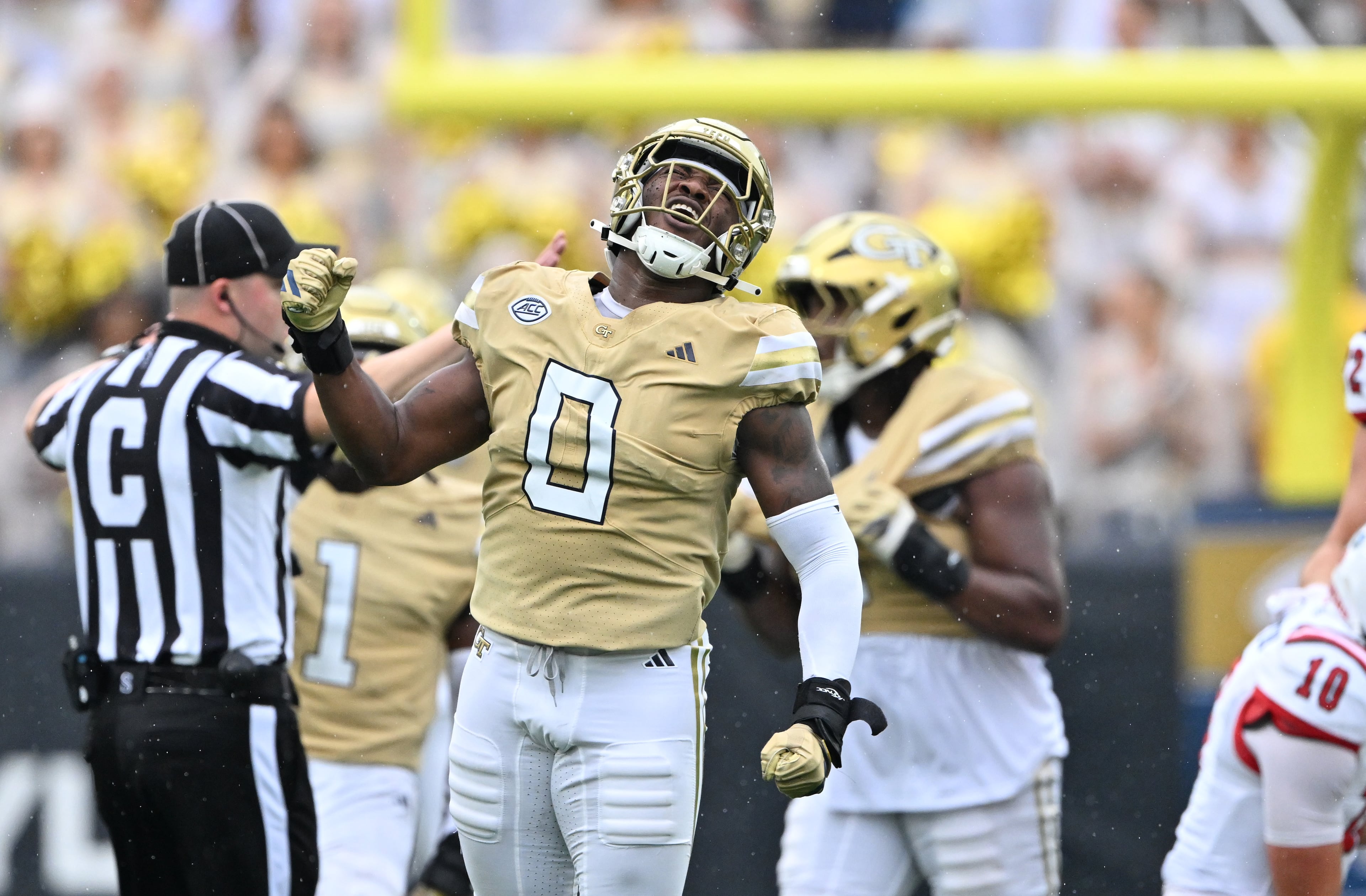Georgia Tech linebacker Melvin Jordan IV (0) celebrates after sacking Gardner-Webb quarterback Nate Hampton during the first half of an NCAA college football game at Georgia Tech's Bobby Dodd Stadium, Saturday, November 6, 2025 in Atlanta. (Hyosub Shin / AJC)
