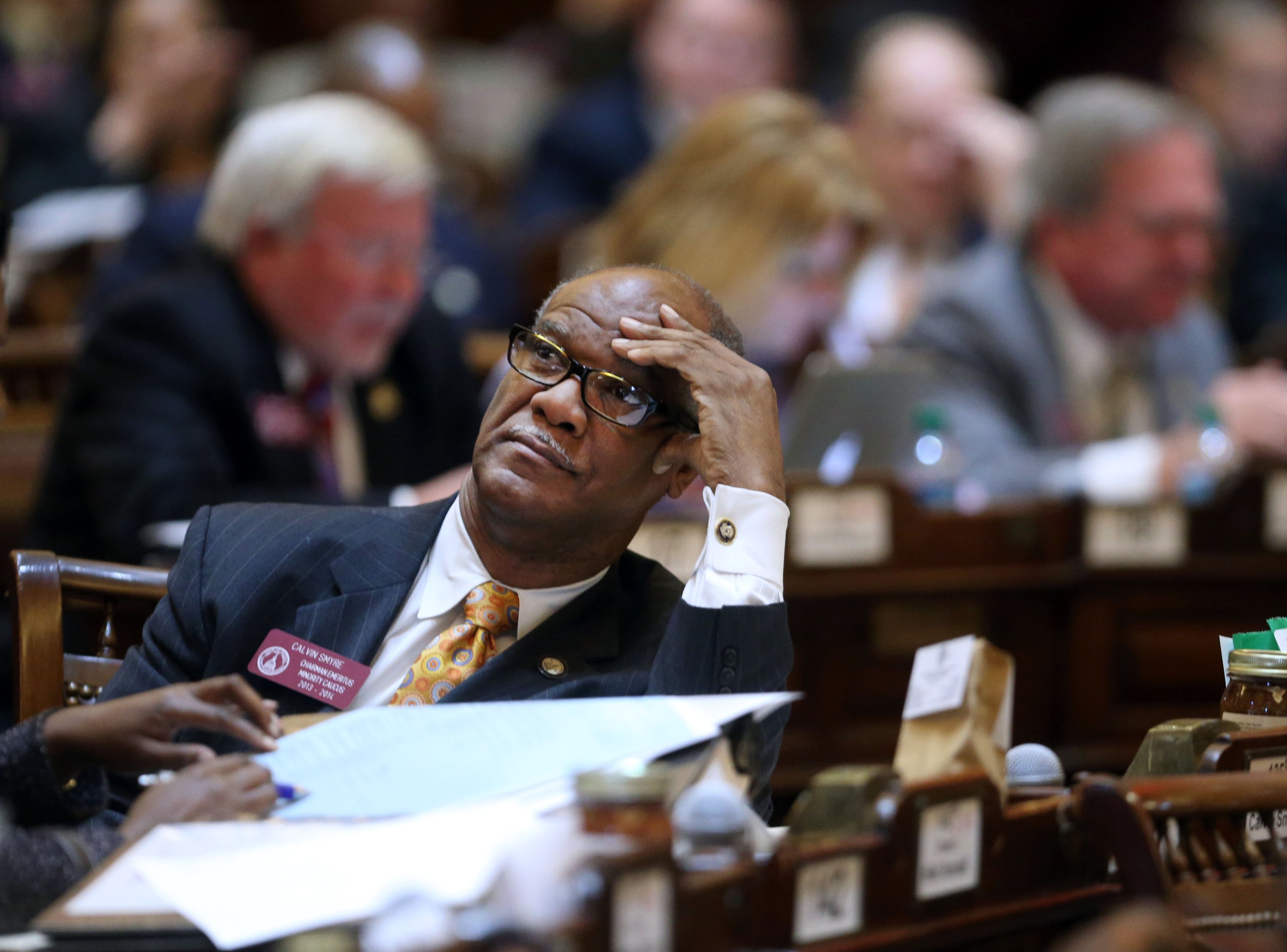 Rep. Calvin Smyre, D-Columbus, watches the voting board Monday as several Democrat bills were tabled or stalled by House Republicans.