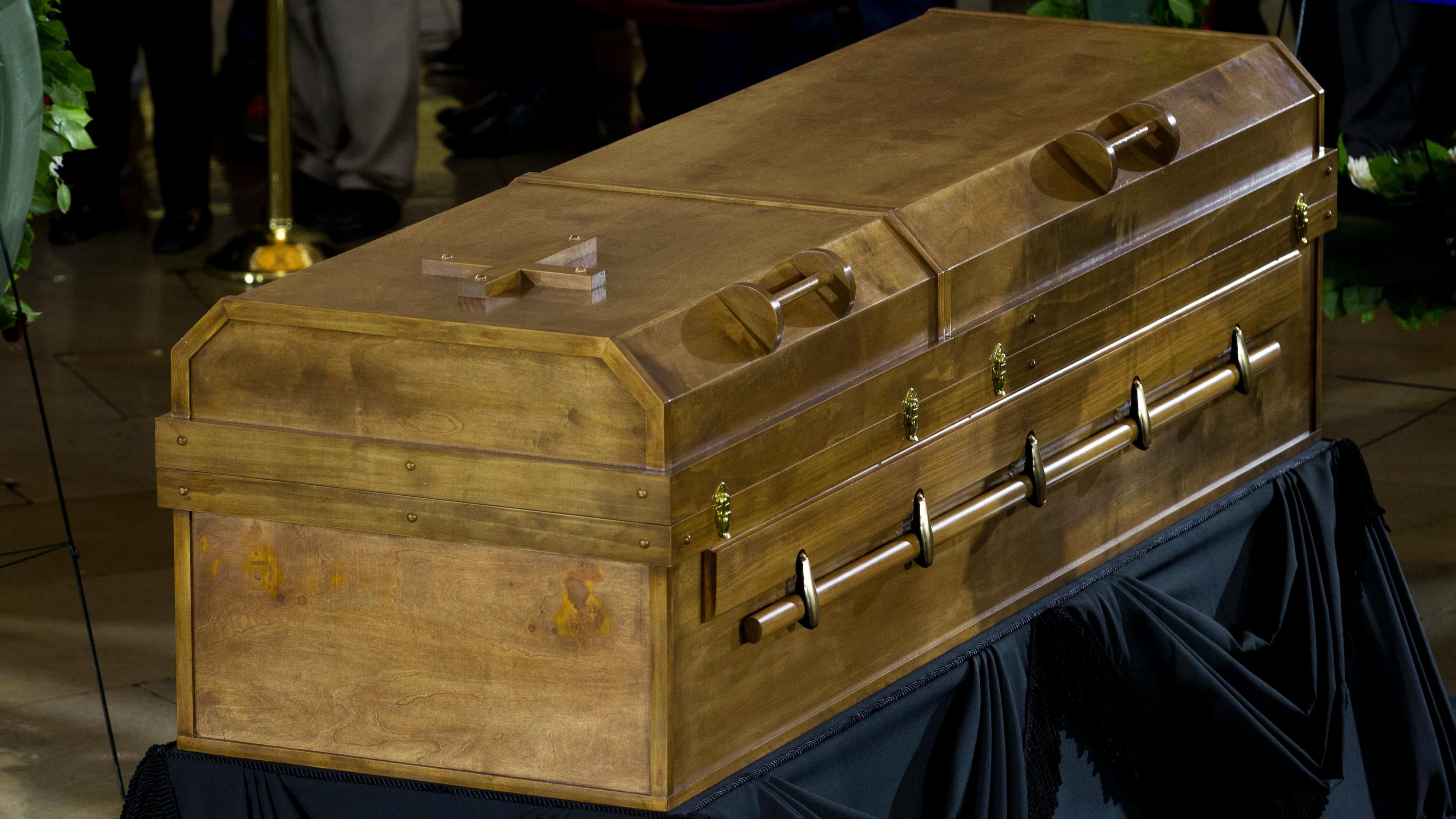 Visitors pay their respects as the casket of Reverend Billy Graham lies in honor at the Rotunda of the U.S. Capitol Building in Washington, Wednesday, Feb. 28, 2018. It's a rare honor for a private citizen to lie in honor at the Capitol. Graham died Wednesday in his sleep at his North Carolina home. He was 99. (AP Photo/Jose Luis Magana)