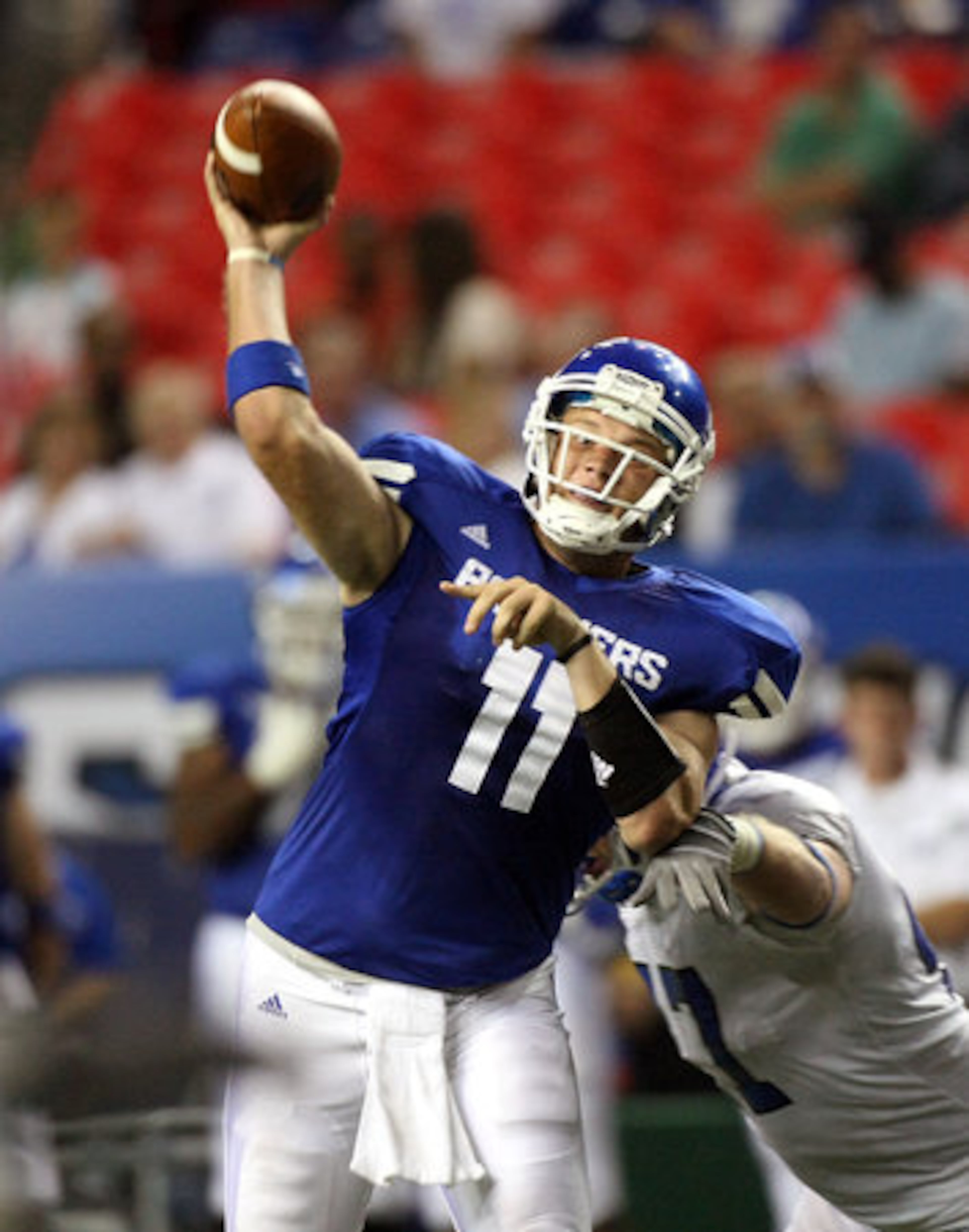 GSU quarterback Drew Little (11) throws a 16-yard touchdown pass during their 41-7 win over Shorter College for their first ever win in the Georgia Dome Thursday night in Atlanta, Ga., Sept. 2, 2010.
