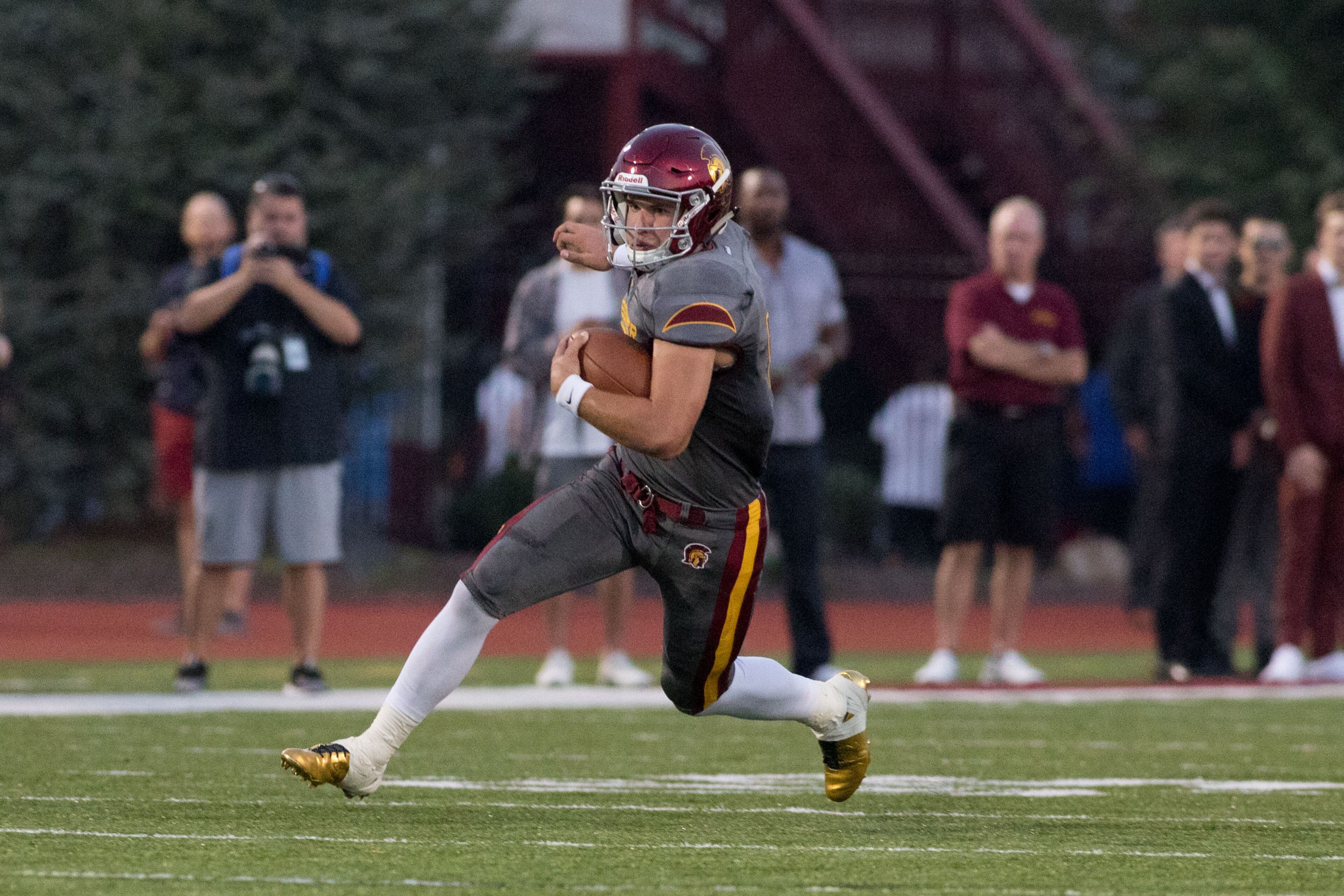 Lassiter High School quarterback Bradley Riopelle (5) runs the ball during a football game against Marietta High School, Friday, Sept. 15, 2017, in Marietta, Ga. BRANDEN CAMP/SPECIAL
