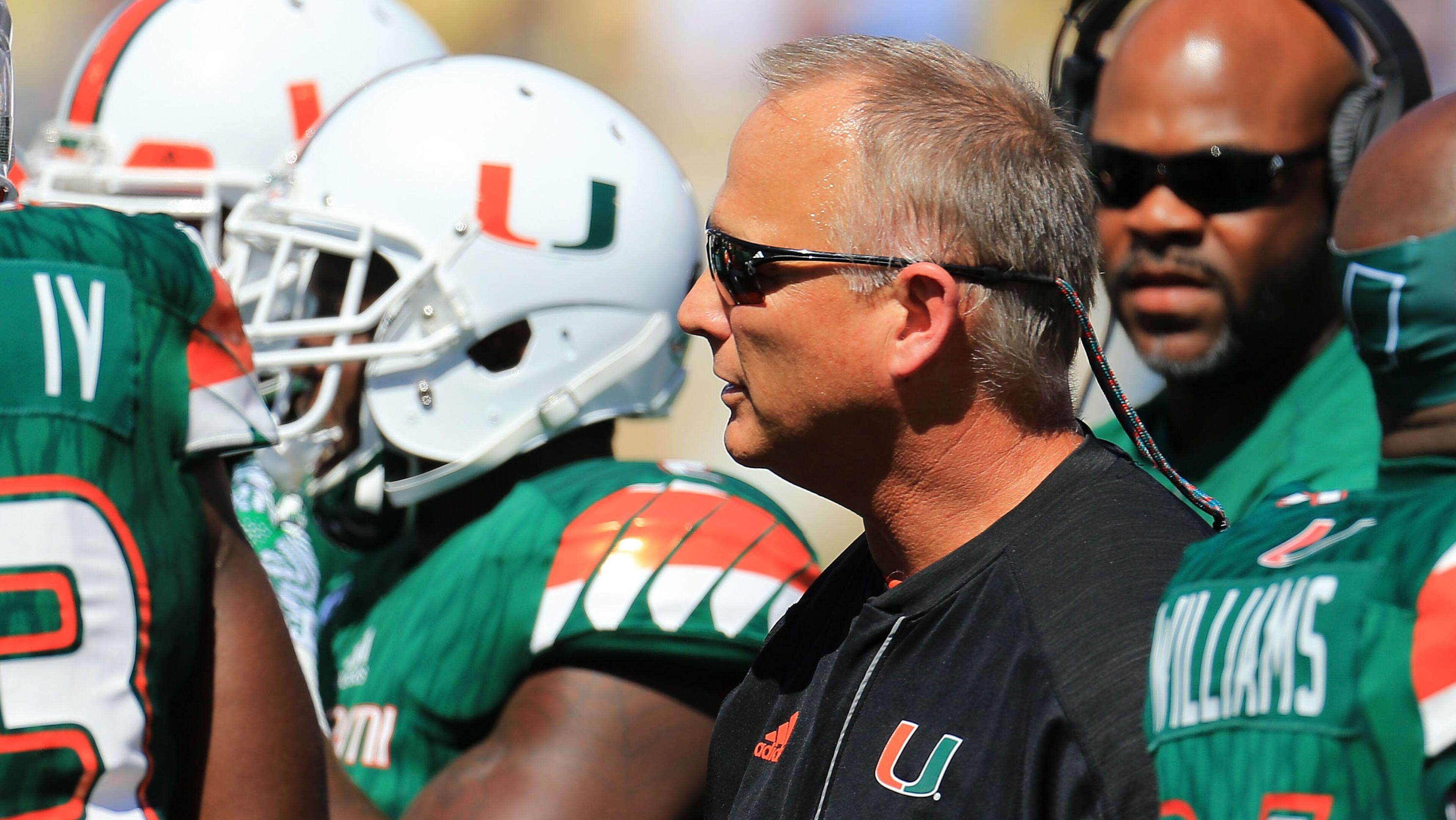 ATLANTA, GA - OCTOBER 01: Head coach Mark Richt of the Miami Hurricanes talks in the huddle during the first half against the Georgia Tech Yellow Jackets at Bobby Dodd Stadium on October 1, 2016 in Atlanta, Georgia. (Photo by Daniel Shirey/Getty Images)