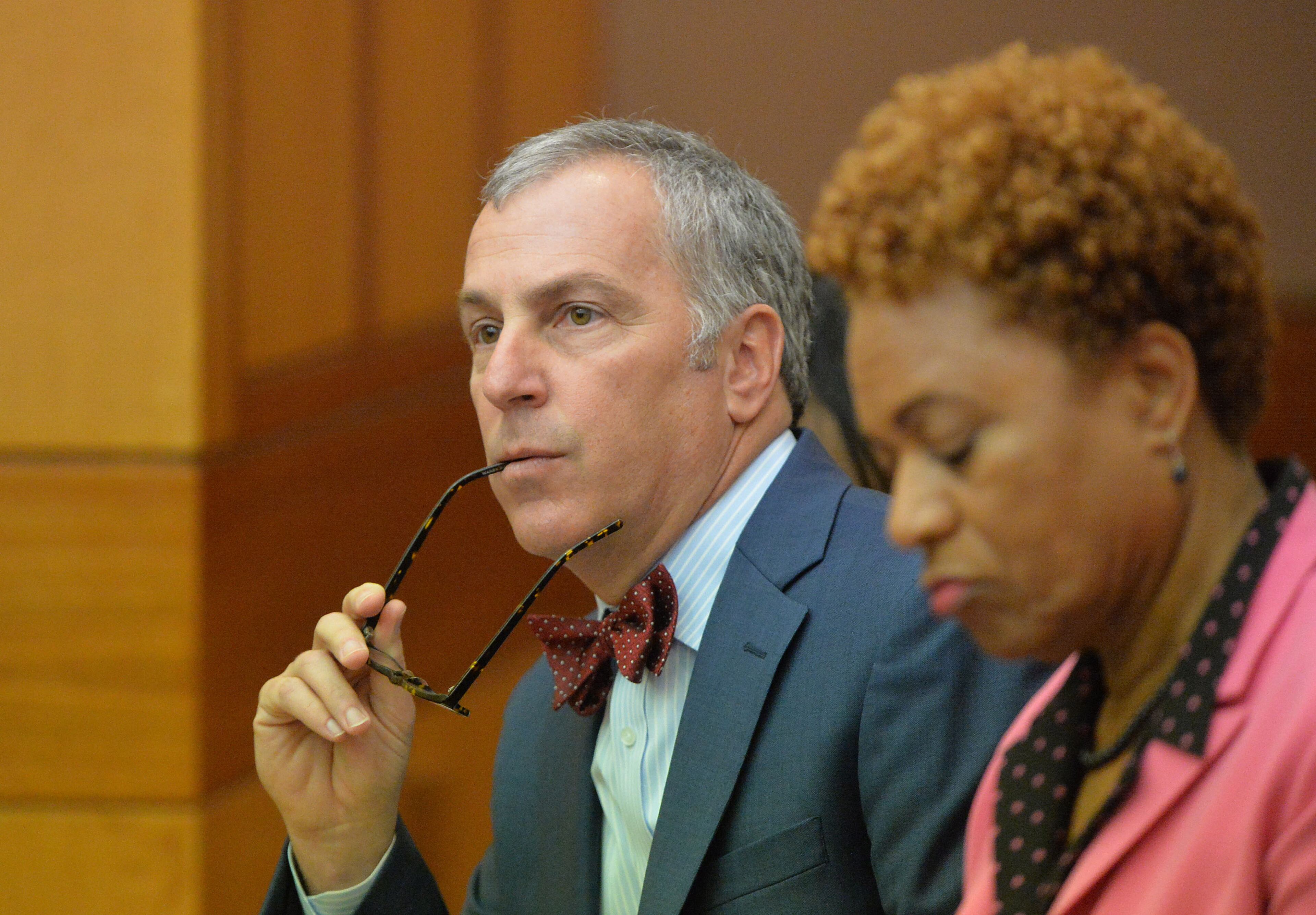 Defense attorney Robert Rubin listens as verdicts are read. At right, former APS SRT Director Sharon Davis Williams reacts following her conviction on racketeering charges. A jury of six men and six women render convicted 11 of 12 defendants on RICO and other assorted charges on their eighth day of deliberations in the Atlanta Public Schools test-cheating trial on Wednesday, April 1, 2015. Jurors sorted through roughly five months of testimony against 12 former educators accused of engaging in a racketeering conspiracy to inflate test scores. (Atlanta Journal-Constitution, Kent D. Johnson, Pool)