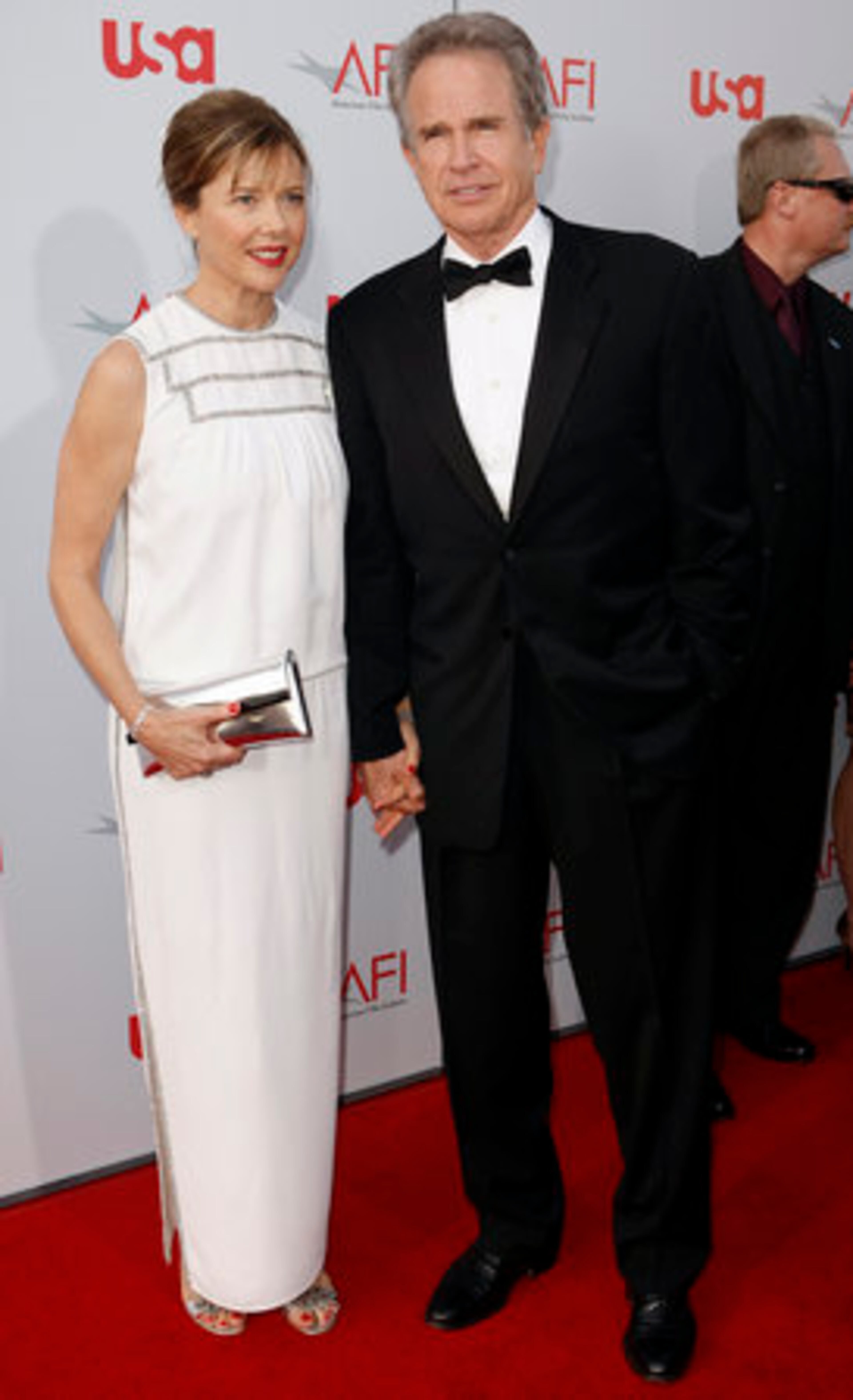 Warren Beatty and wife Annette Bening arrive at the American Film Institute Life Achievement Award dinner honoring the actor-activist in Los Angeles on Thursday.