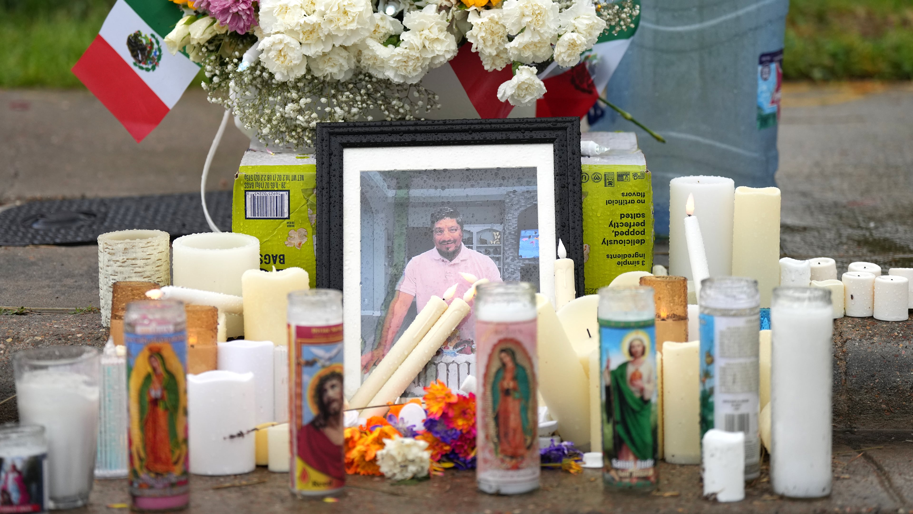 A memorial grows at the site where Lorenzo Salgado Araujo was fatally shot by ICE agents, last week, on Monday, July 13, 2026, in Houston. (AP Photo/Karen Warren)