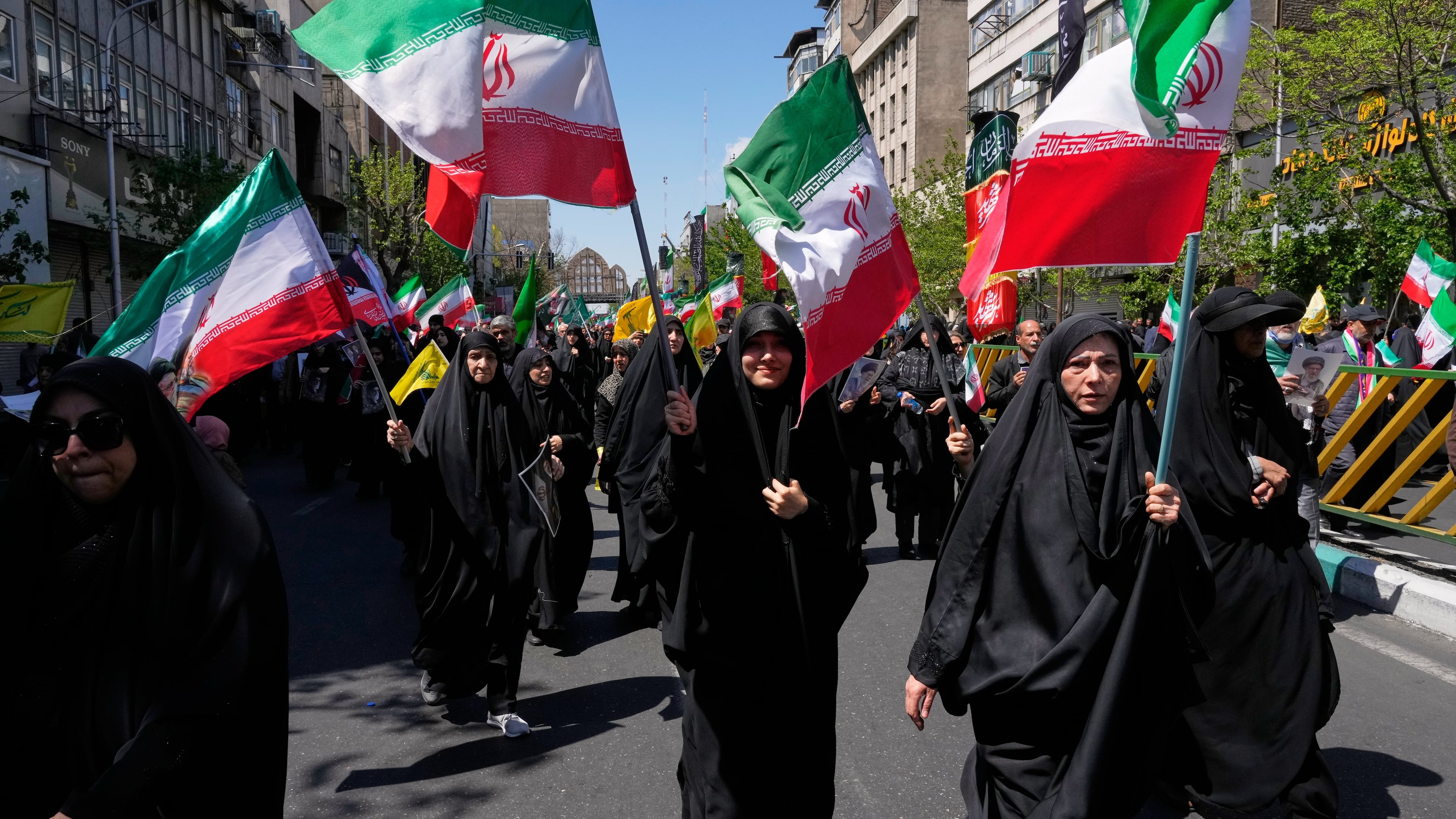 Government supporters gather to mark the 40th day since the death of Supreme Leader Ayatollah Ali Khamenei in Tehran, Iran, Thursday, April 9, 2026. (AP Photo/Vahid Salemi)