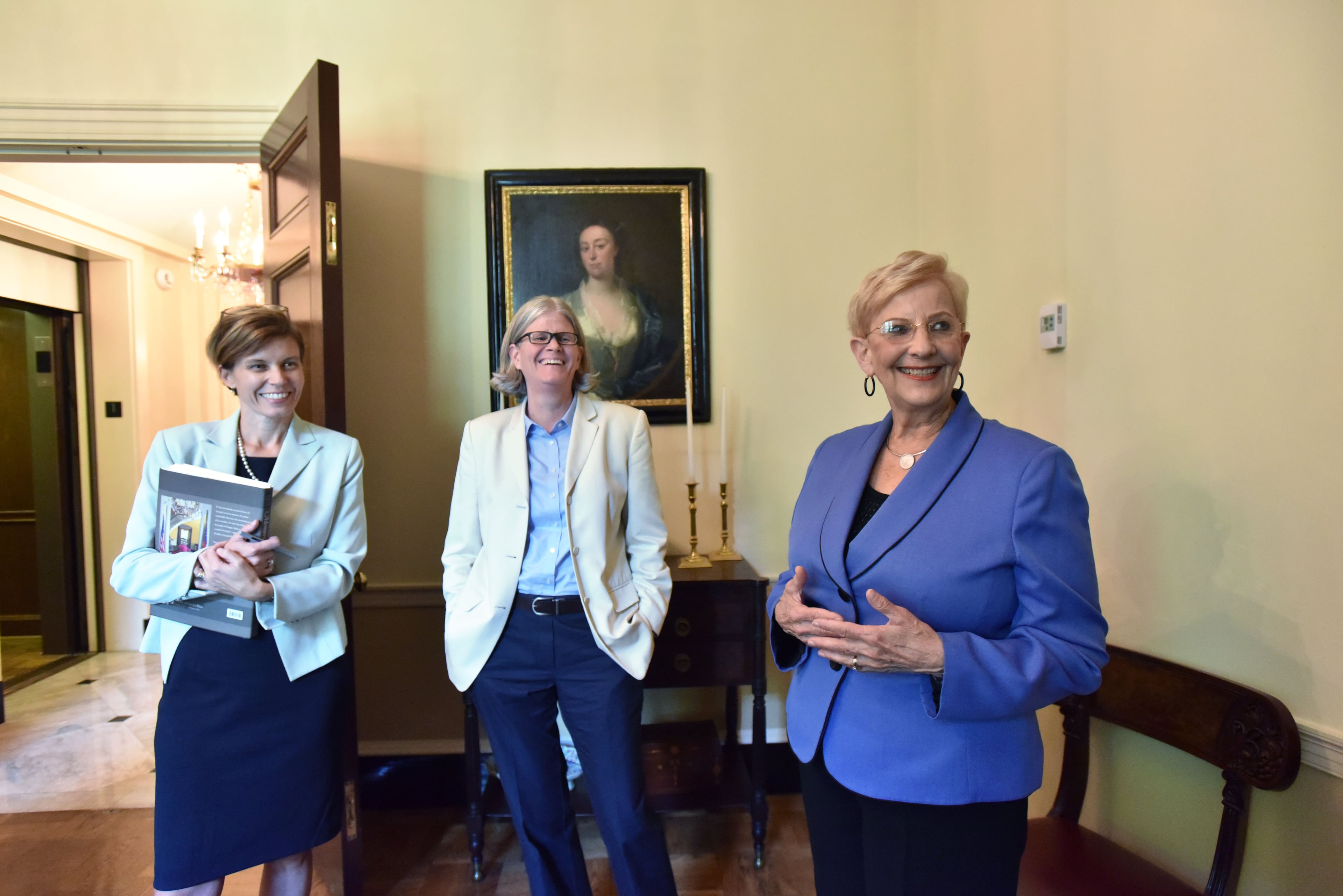 First Lady Sandra Deal talks as co-authors Catherine Lewis (left) and Jennifer Dickey, both historians and history professors at Kennesaw State University, look through The Governor's Mansion on Wednesday, Sept. 9, 2015. First Lady Sandra Deal, along with two history professors at Kennesaw State University, wrote the book "Memories of the Mansion - The Story of Georgia's Governor's Mansion." They worked closely with the former first families (Maddox, Carter, Busbee, Harris, Miller, Barnes, Perdue, and Deal) to capture behind-the-scenes anecdotes of what life was like in the state's most public house. HYOSUB SHIN / HSHIN@AJC.COM