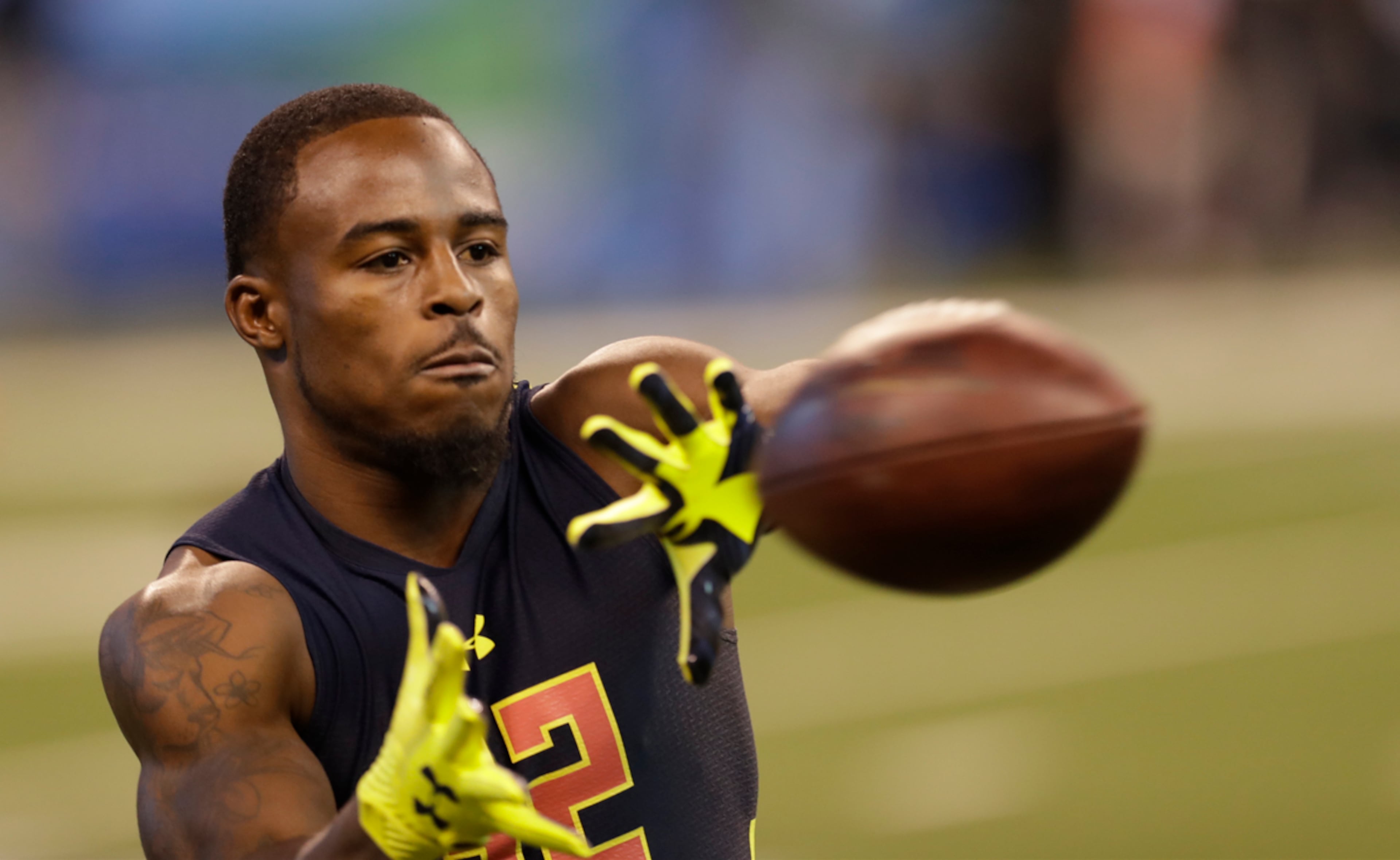 Georgia wide receiver Isaiah Mckenzie runs a drill at the NFL football scouting combine Saturday, March 4, 2017, in Indianapolis. (AP Photo/David J. Phillip)