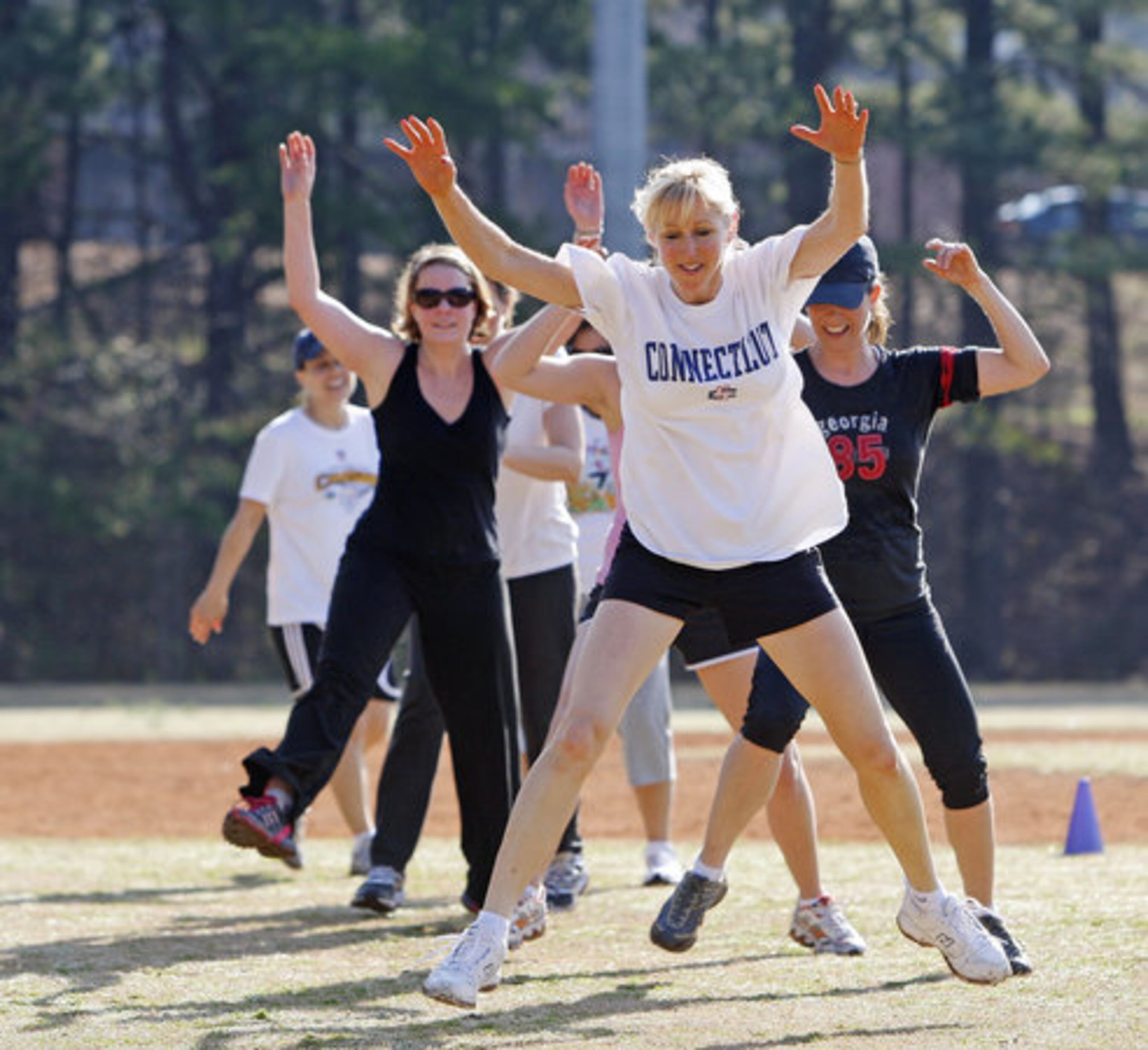 Kim Aquino is jumping with her athletes.