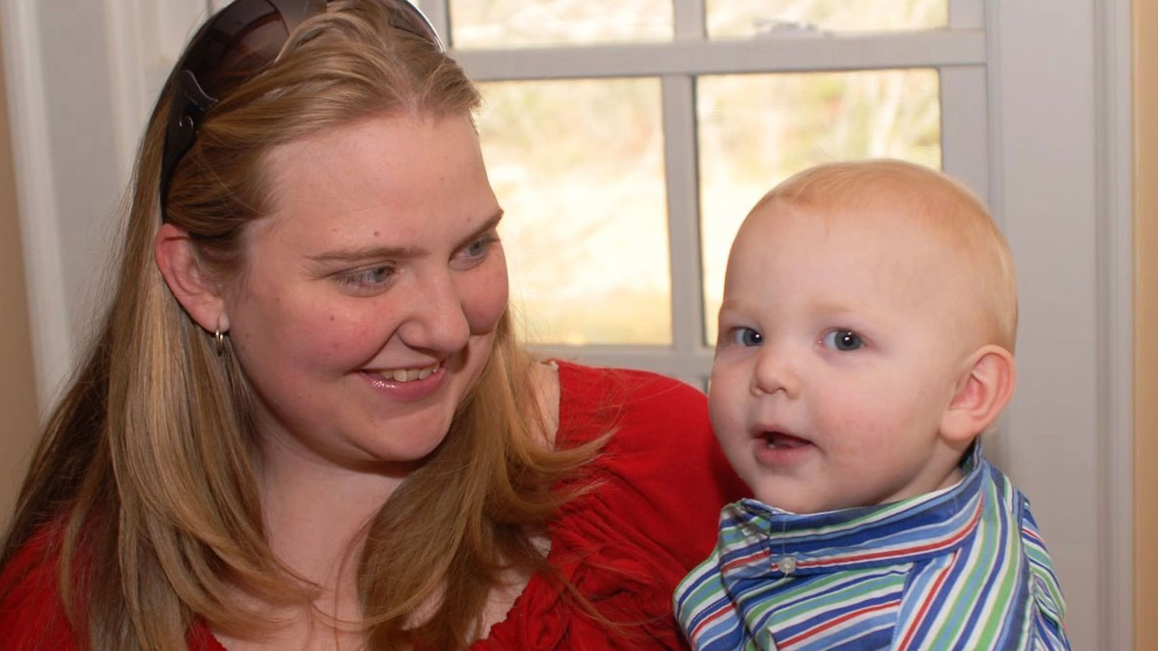 A family snapshot from 2008 shows Heather Allen Strube, left, with son Carson. On April 26, 2009, Strube was shot and killed in the parking lot of a Snellville Target moments after a custody exchange.