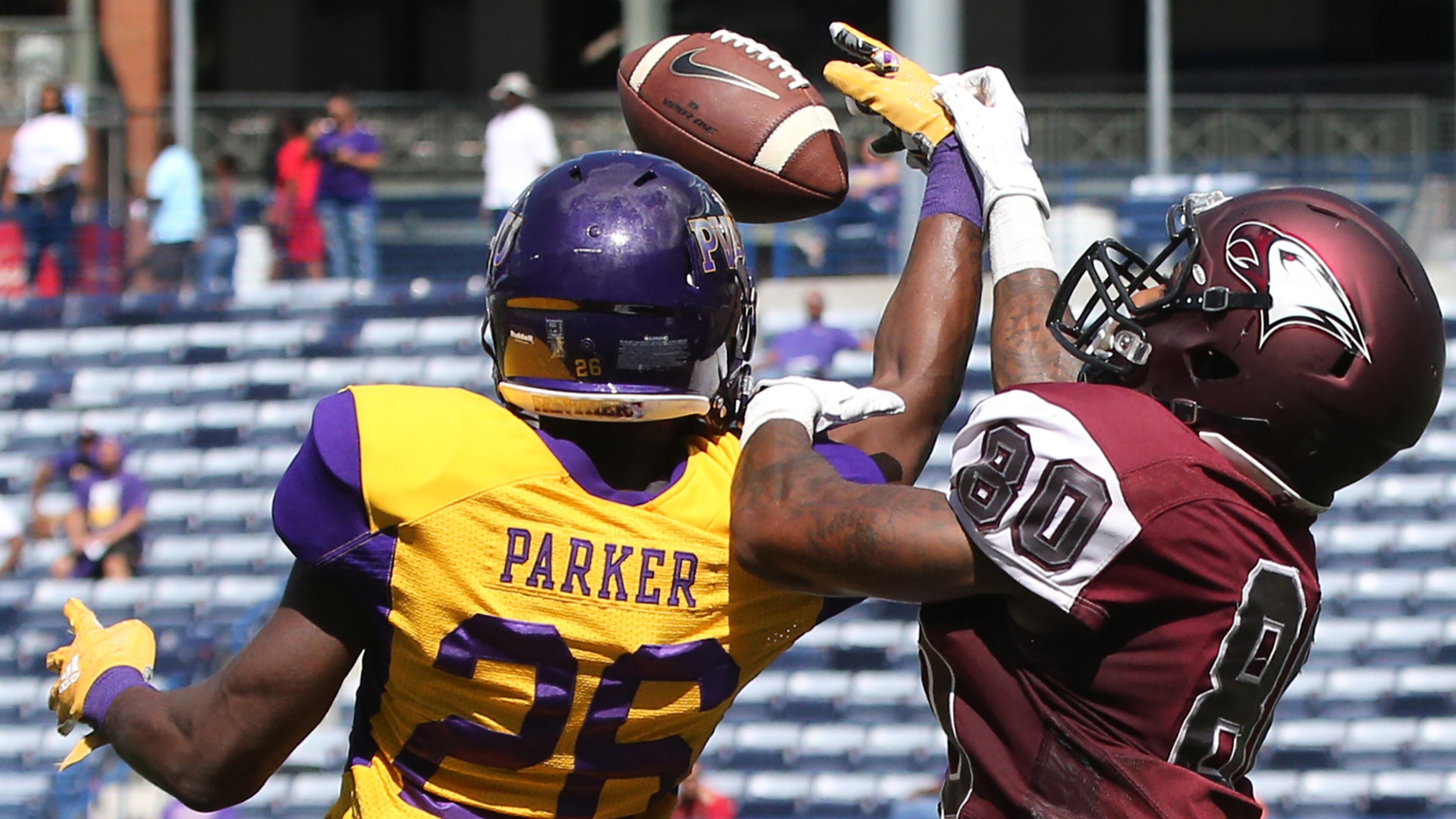 Prairie View A&M defensive back Ju'Anthony Parker breaks up a pass to North Carolina Central wide receiver E.J. Hicks during the second half of the MEAC-SWAC Challenge Sunday, Sept. 2, 2018, in Atlanta.