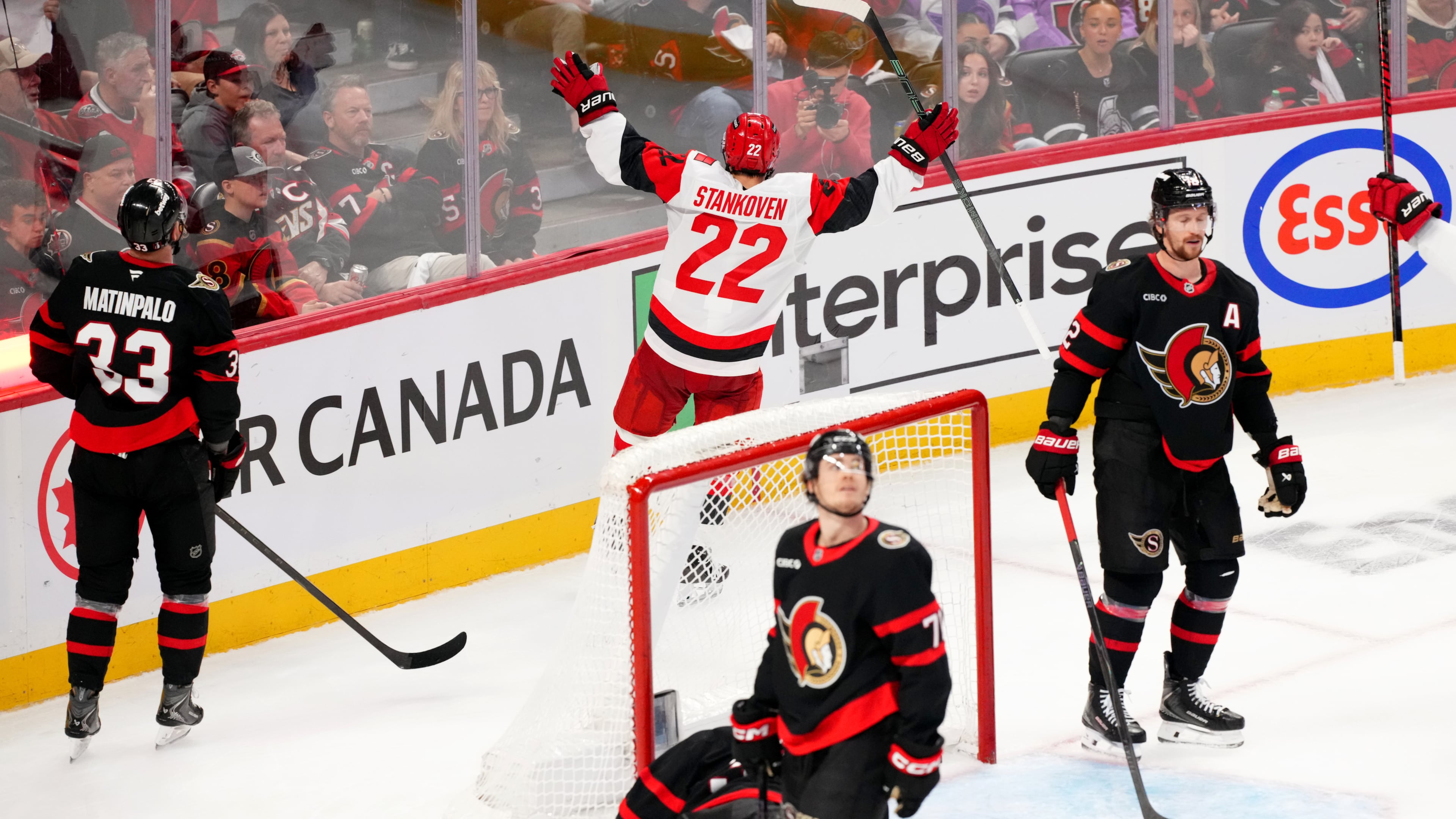 Carolina Hurricanes centre Logan Stankoven (22) celebrates his goal past Ottawa Senators goaltender Linus Ullmark (35) during the third period in Game 4 of a first-round NHL Stanley Cup playoff hockey series, Saturday, April 25, 2026, in Ottawa, Ontario. (Sean Kilpatrick/The Canadian Press via AP)