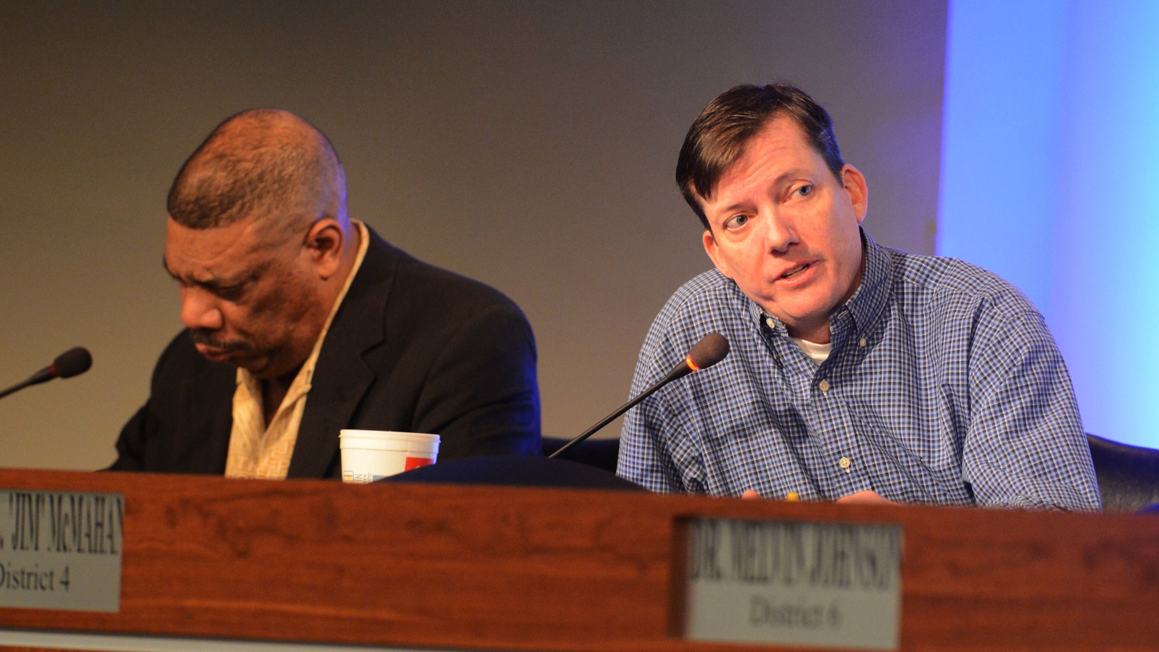 Former DeKalb County school board member Jim McMahan (right) asks a question at a board meeting in 2013. McMahan died Sunday in a personal watercraft collision on Alabama’s Lake Wedowee. AJC FILE