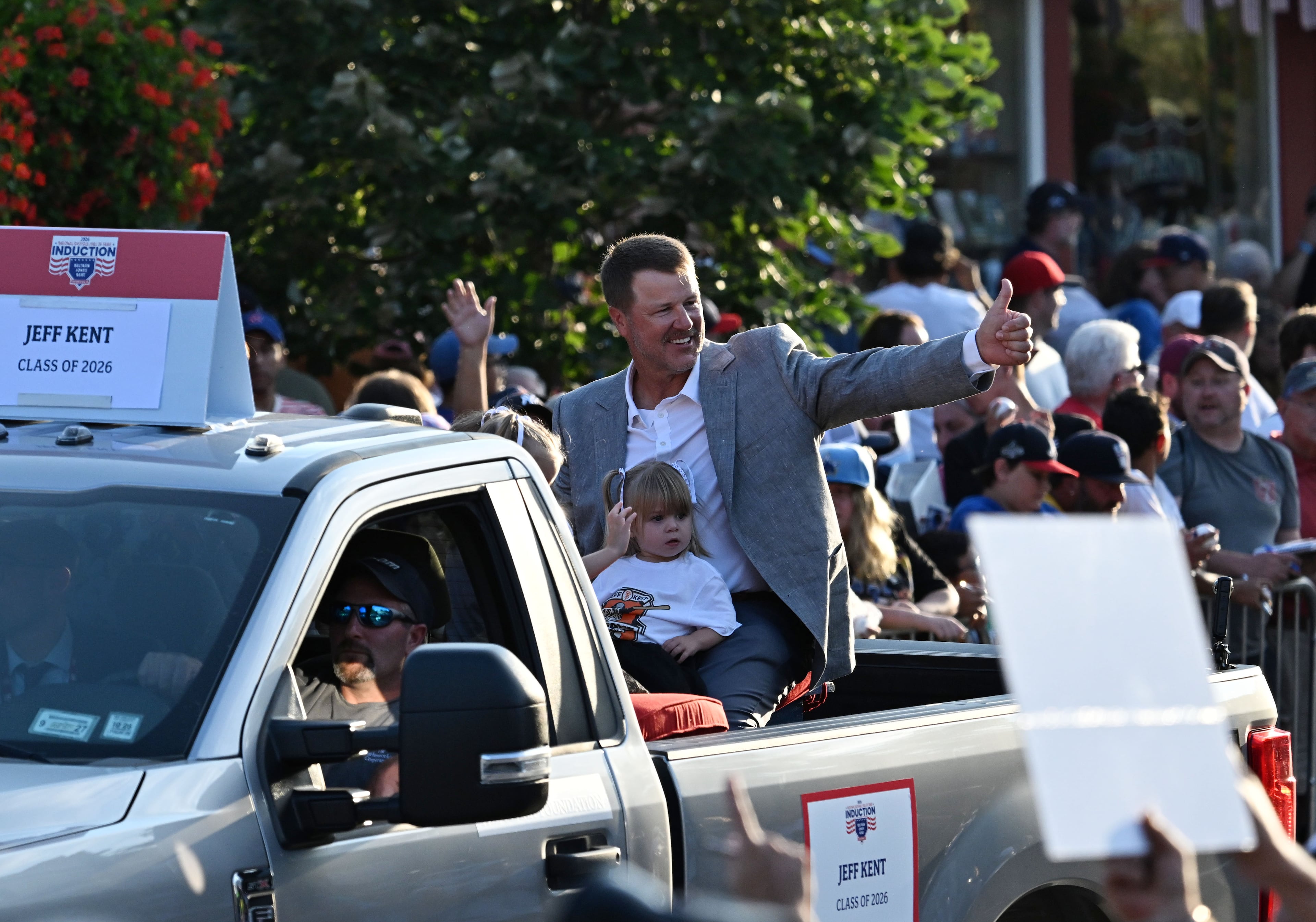 Jeff Kent and his family react during the Hall of Fame Legends Parade on Saturday, July 25, 2026, in Cooperstown, N.Y. Kent will be inducted into the National Baseball Hall of Fame on Sunday as part of the Class of 2026, alongside Carlos Beltrán and former Brave Andruw Jones. (Hyosub Shin/AJC)