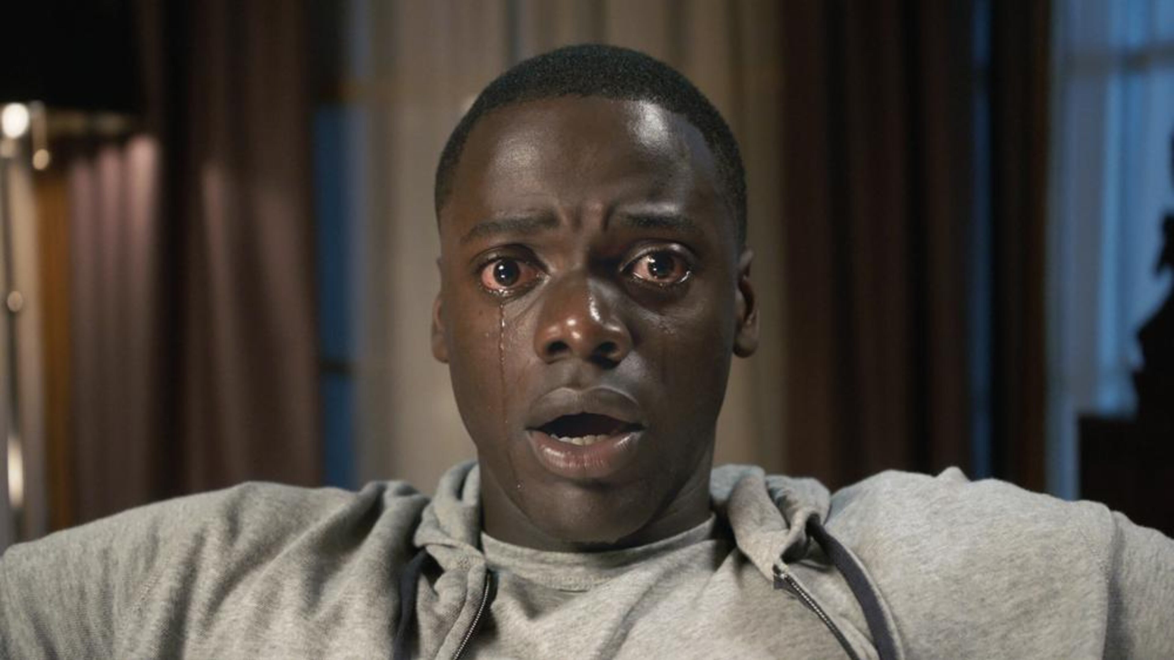 DANIEL KALUUYA as Chris Washington in Universal Picturesâ âGet Out,â a speculative thriller from Blumhouse (producers of âThe Visit,â âInsidiousâ series and âThe Giftâ) and the mind of Jordan Peele. When a young African-American man visits his white girlfriendâs family estate, he becomes ensnared in a more sinister real reason for the invitation.