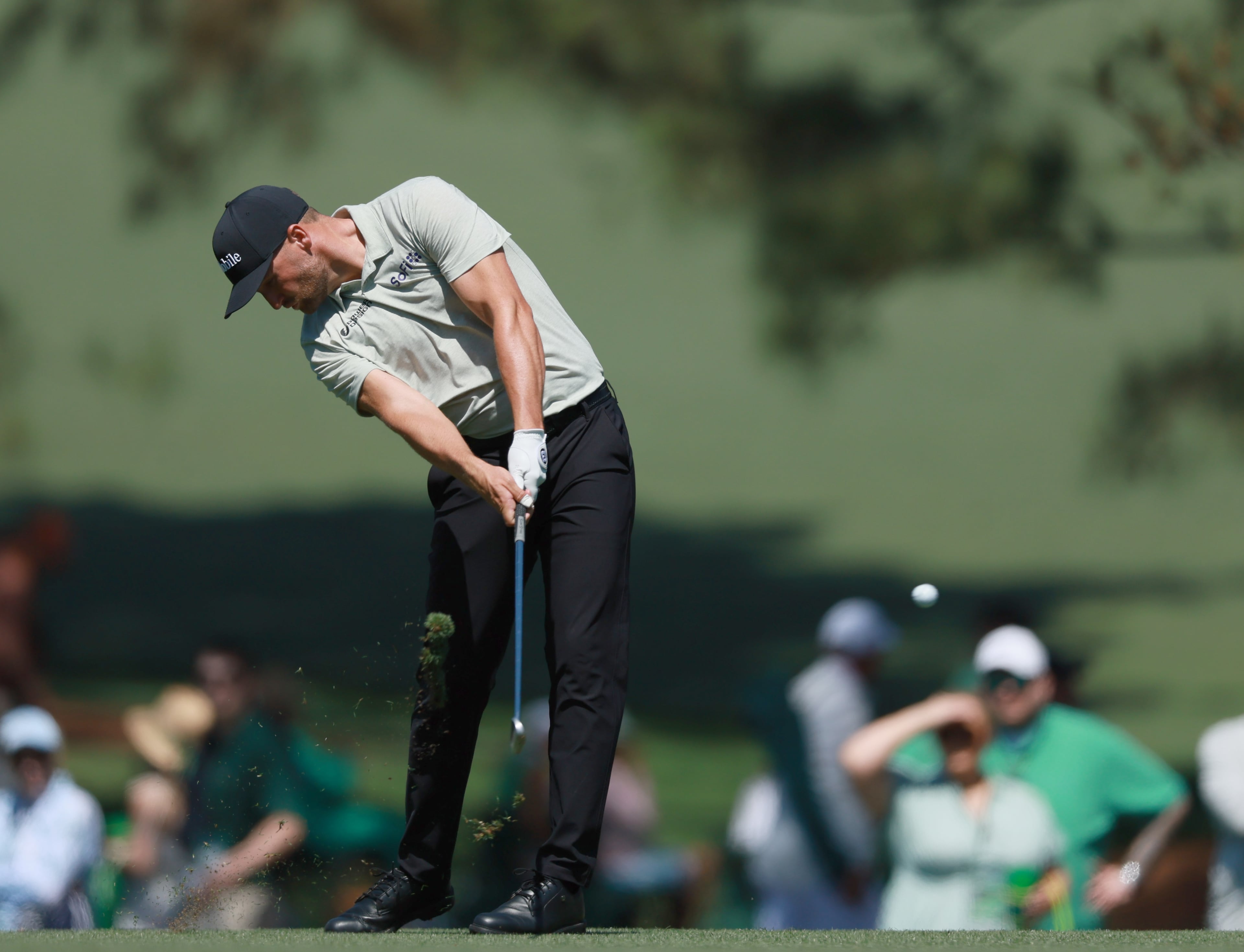 Wyndham Clark hits a fairway shot on the 17th hole during the second round of the Masters at Augusta National on Friday, April 10, 2026 in Augusta, Ga. (Jason Getz/AJC)