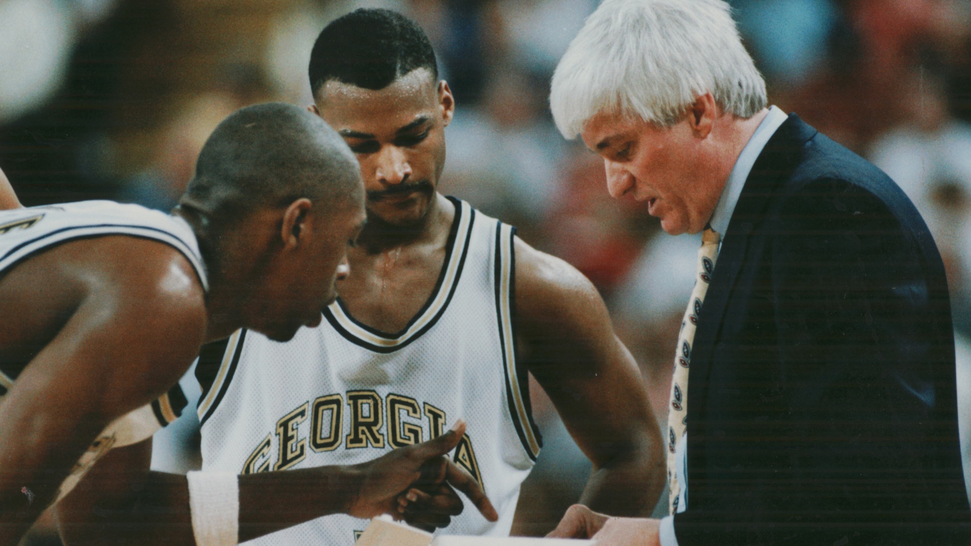940220 - ATLANTA, GA -- Georgia Tech coach Bobby Cremins (R) huddles with Travis Best (C) and teammate Martice Moore in 2nd half action of the matchup with Wake Forest February 19, 1994. (David Tulis/AJC staff) 1994