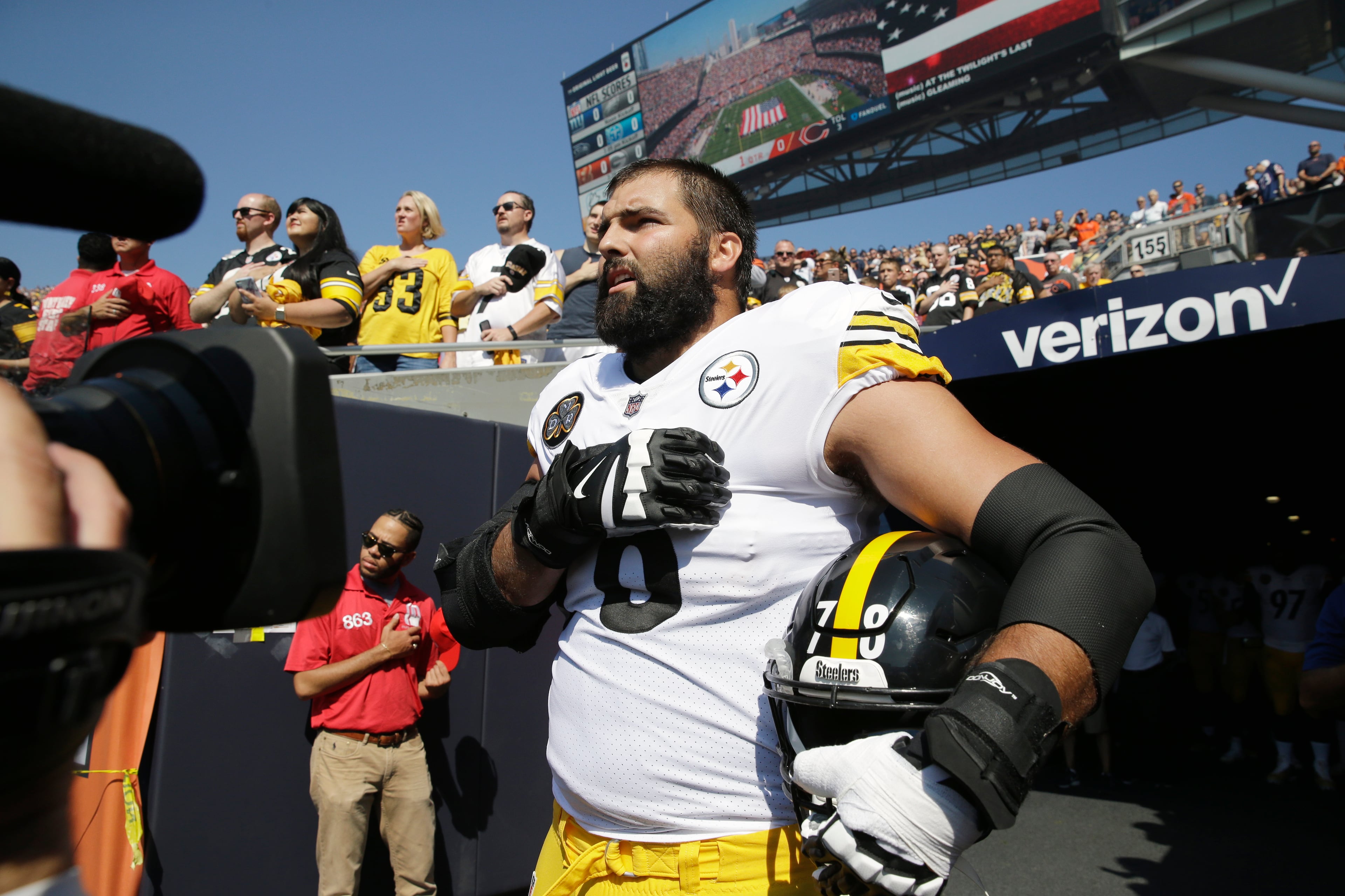 Pittsburgh Steelers offensive tackle and former Army Ranger Alejandro Villanueva (78) stands outside the tunnel alone during the national anthem before an NFL football game against the Chicago Bears, Sunday, Sept. 24, 2017, in Chicago. (AP Photo/Nam Y. Huh)