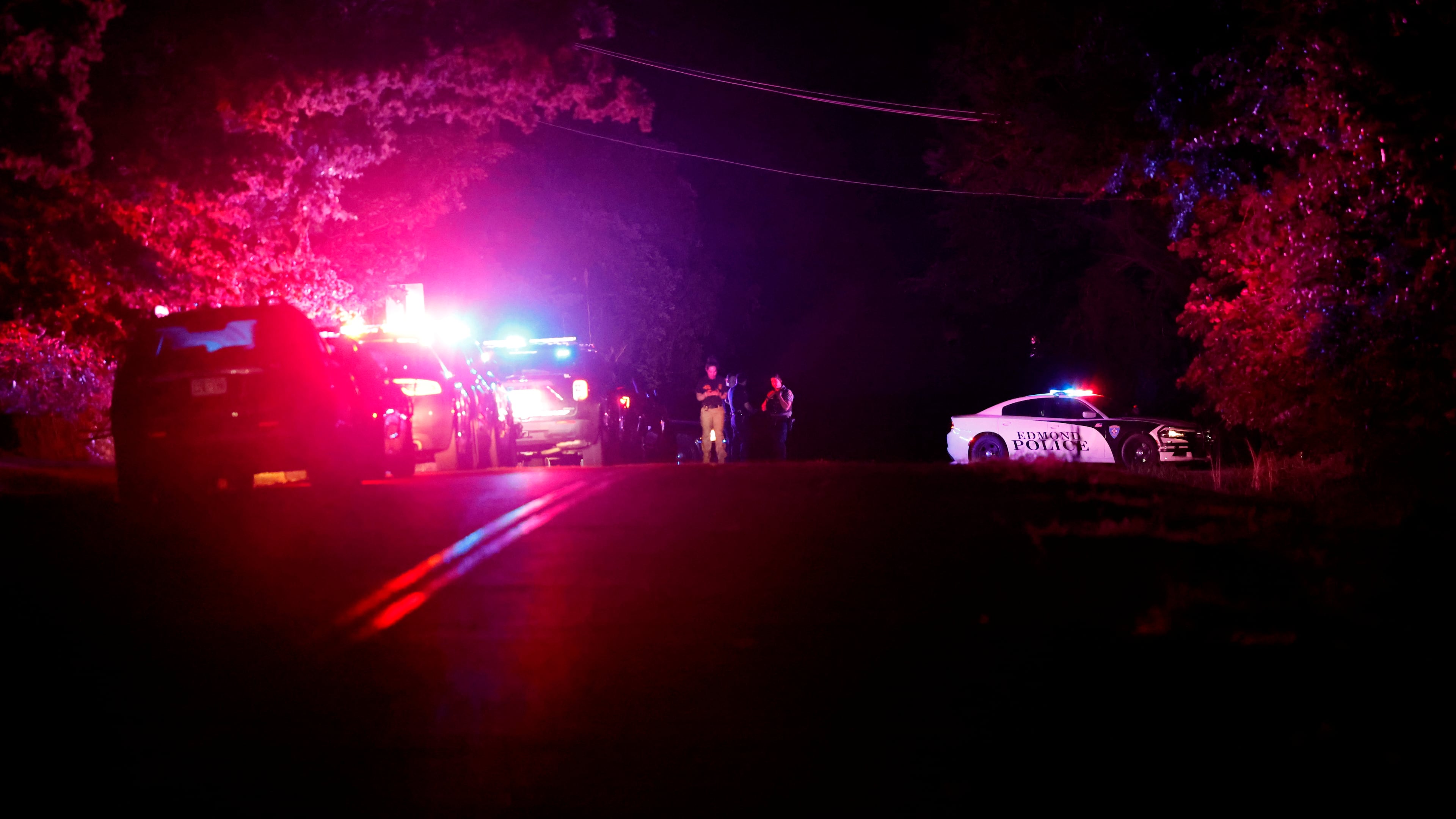 Police block off near S. Air Depot boulevard in Edmond, Okla., after a campground shooting at Lake Arcadia, Saturday, May 3, 2026. (AP Photo/Alonzo Adams)