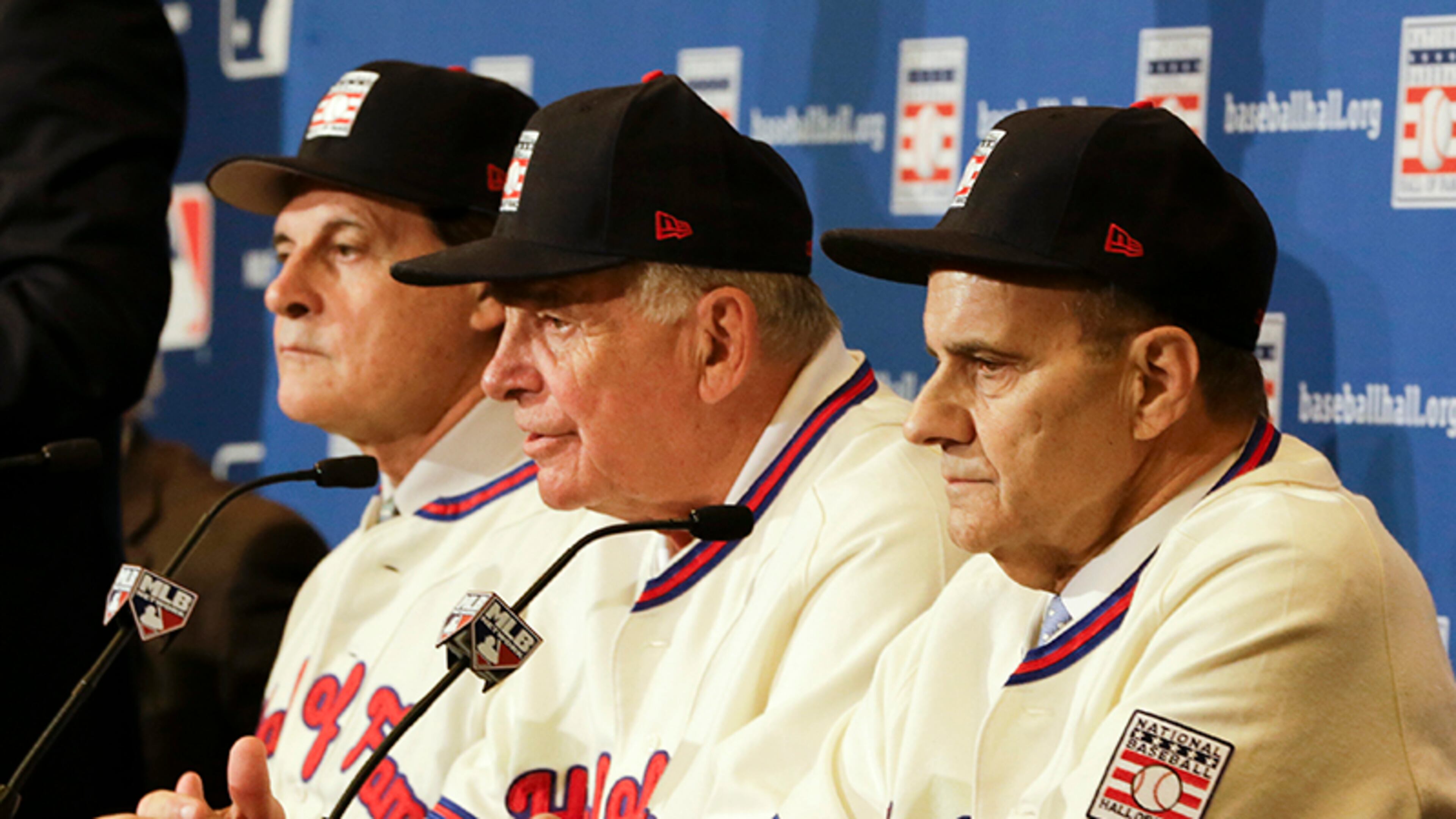 Retired managers Tony La Russa (from left), Bobby Cox and Joe Torre address reporters Monday after it was announced the three were unanimously elected to the baseball Hall of Fame during the MLB winter meetings in Lake Buena Vista, Fla.