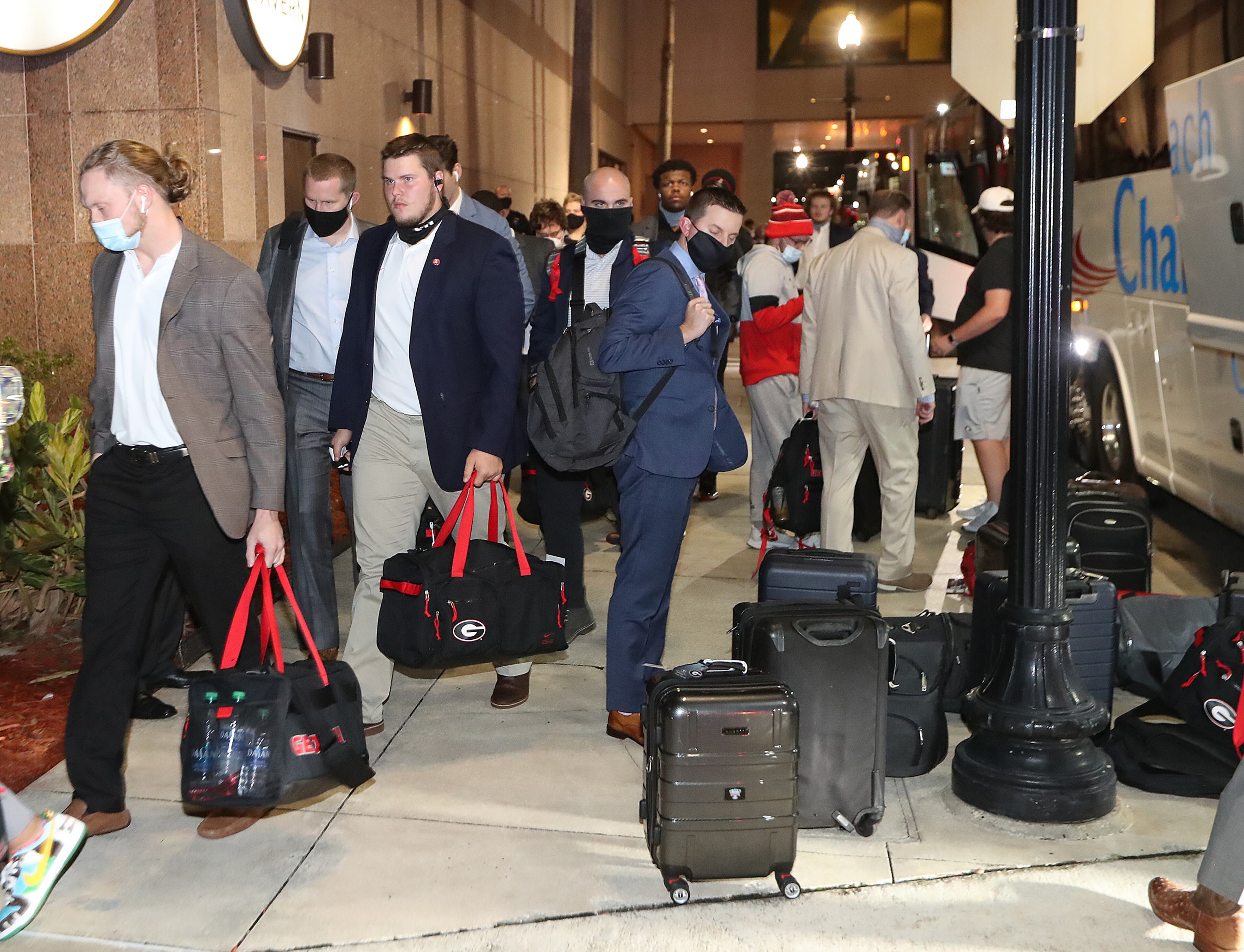 110620 Jacksonville: UGA team members arrive at the Hyatt Regency hotel on Friday night, Nov 6, 2020 in Jacksonville, for the Georgia vs Florida game. “Curtis Compton / Curtis.Compton@ajc.com”