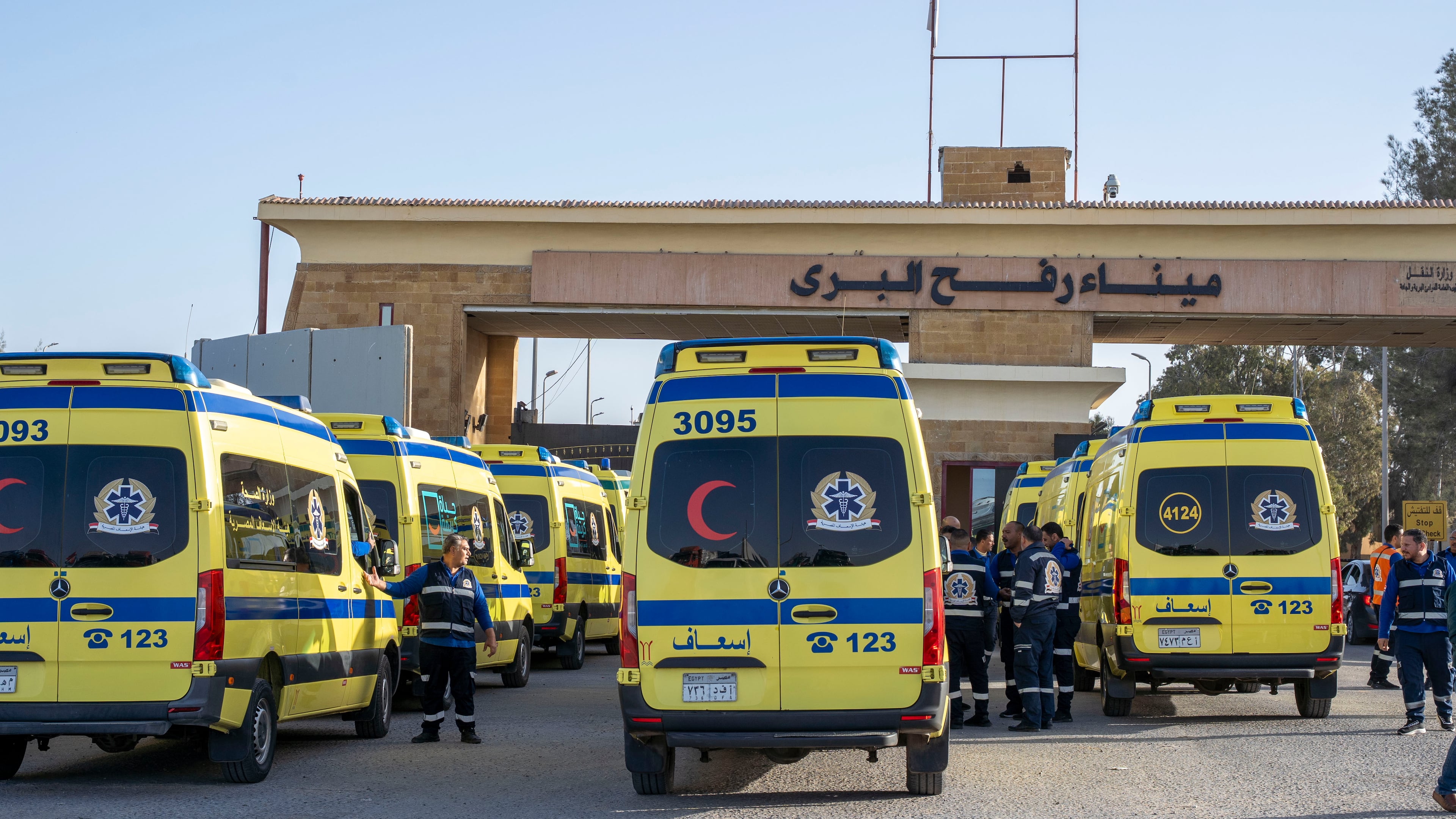 Ambulances line up to enter the Egyptian gate of the Rafah crossing on the way to the Gaza Strip, in Rafah, Egypt, Sunday, Feb. 1, 2026. (AP Photo/Mohamed Arafat)