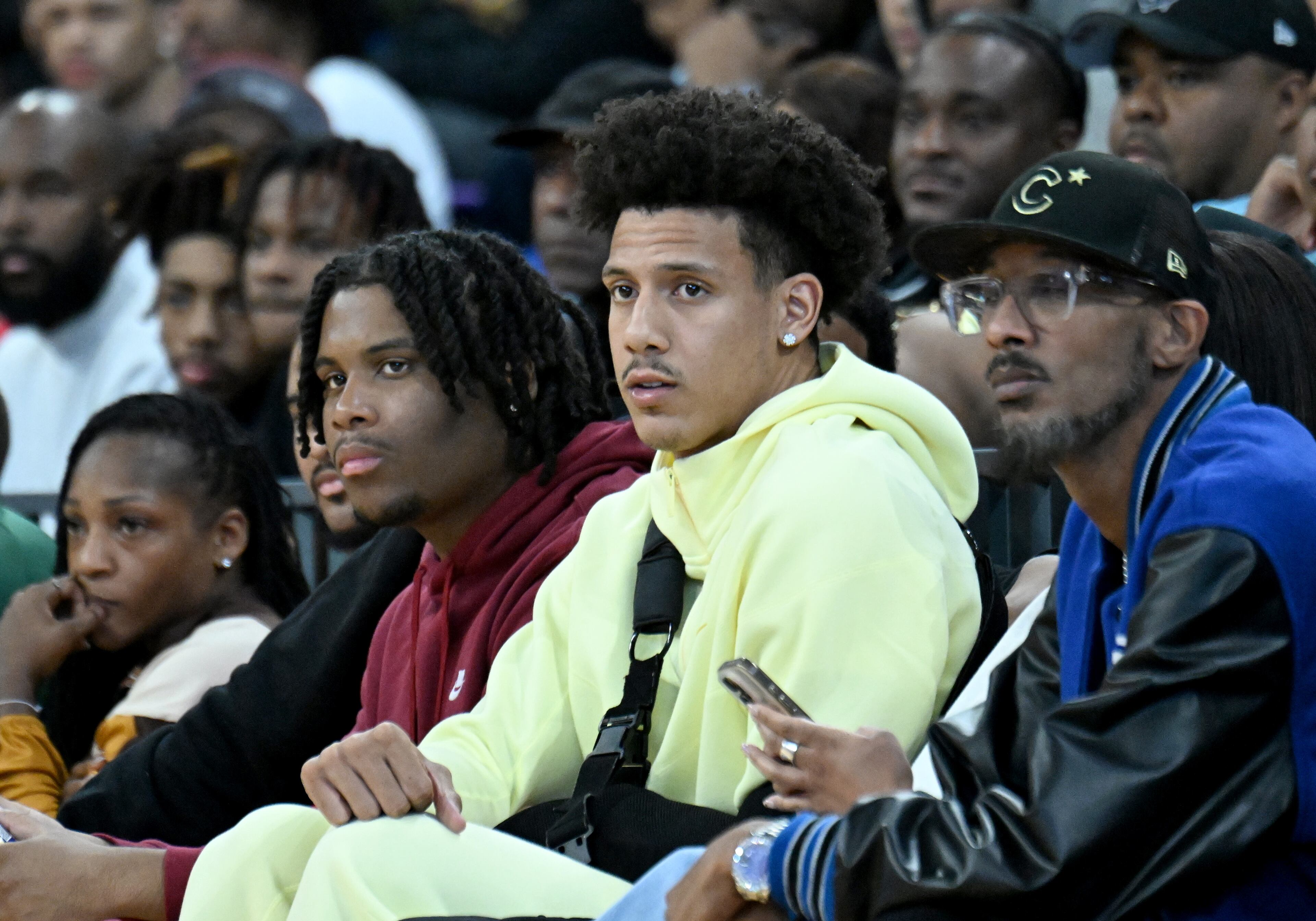 Hawks player Jalen Tyrese Johnson watches during the first half of the GHSA Class 6A Boys State Basketball playoffs game at the Georgia State Convocation Center, Saturday, March 1, 2025, in Atlanta. Wheeler won 68-53 over Grayson. (Hyosub Shin / AJC)