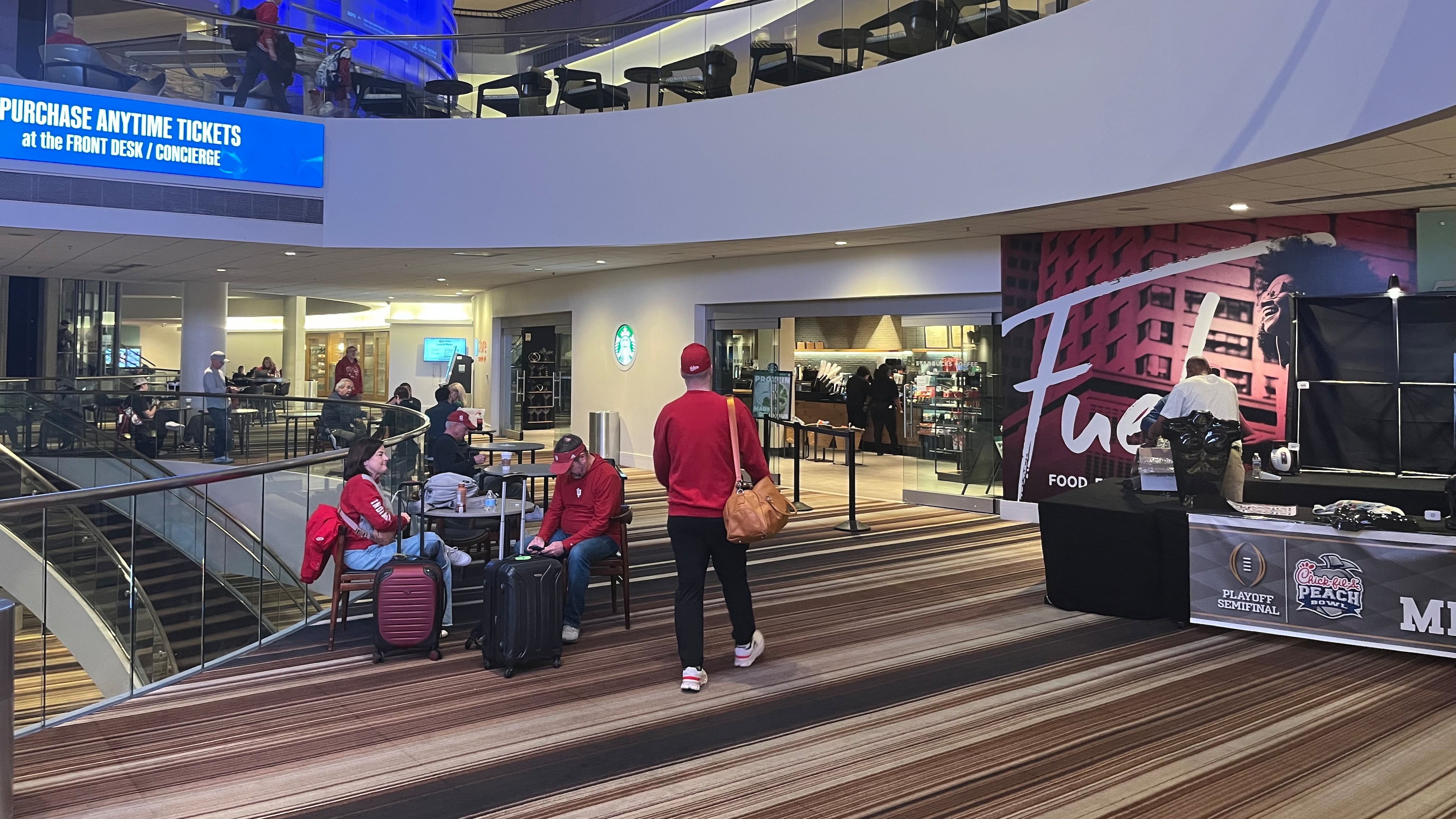 Indiana fans hang out at the Marriott Marquis hotel in downtown Atlanta on Saturday, Jan. 10, 2026, following the team’s dominant Friday night win over the Oregon Ducks in the Peach Bowl. (Jason Armesto/AJC)
