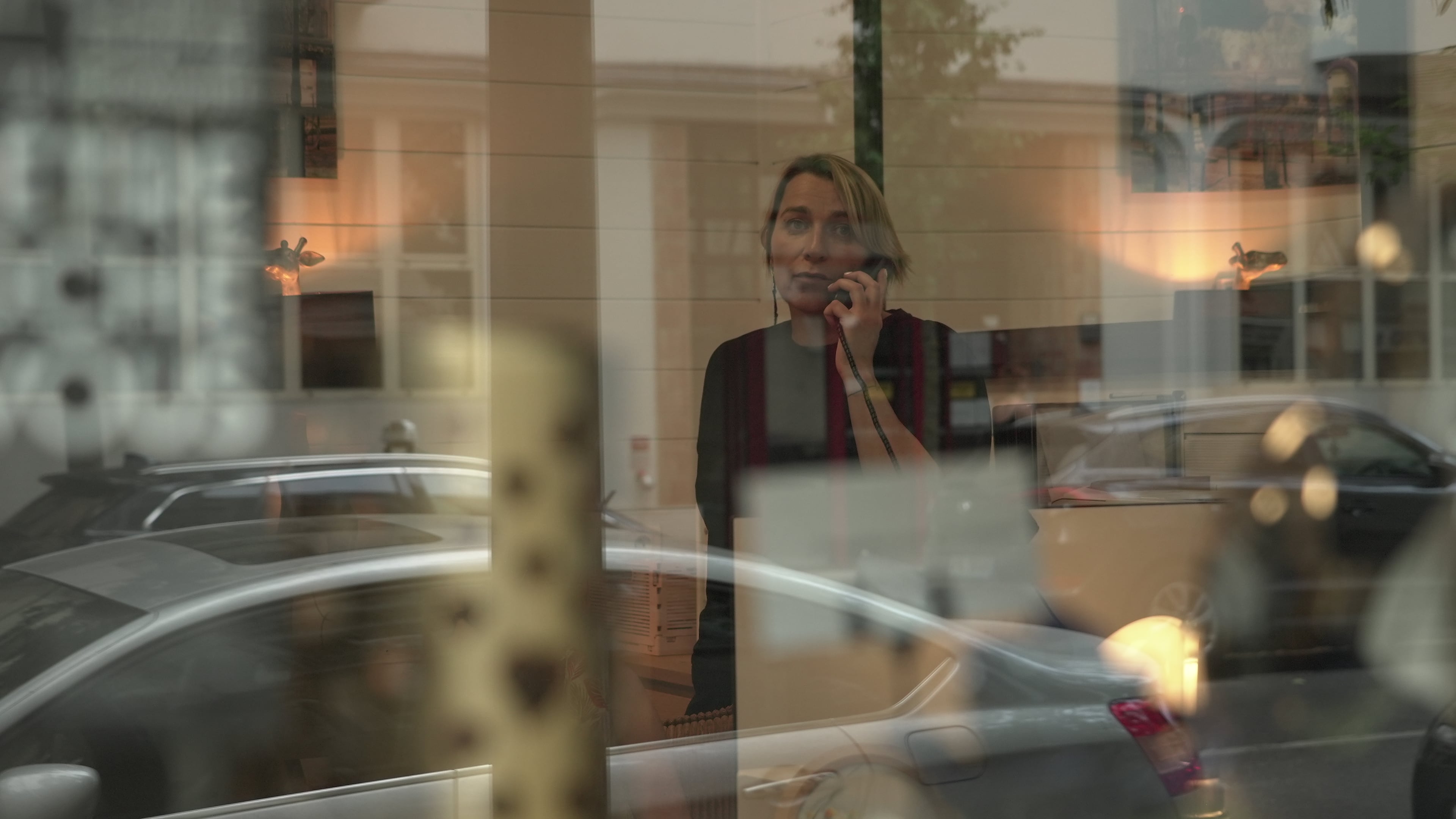 Véronique Bertrand, a funeral director, works the phones Sunday, June 28, 2026, at her office in Paris. (AP Photo/John Leicester)
