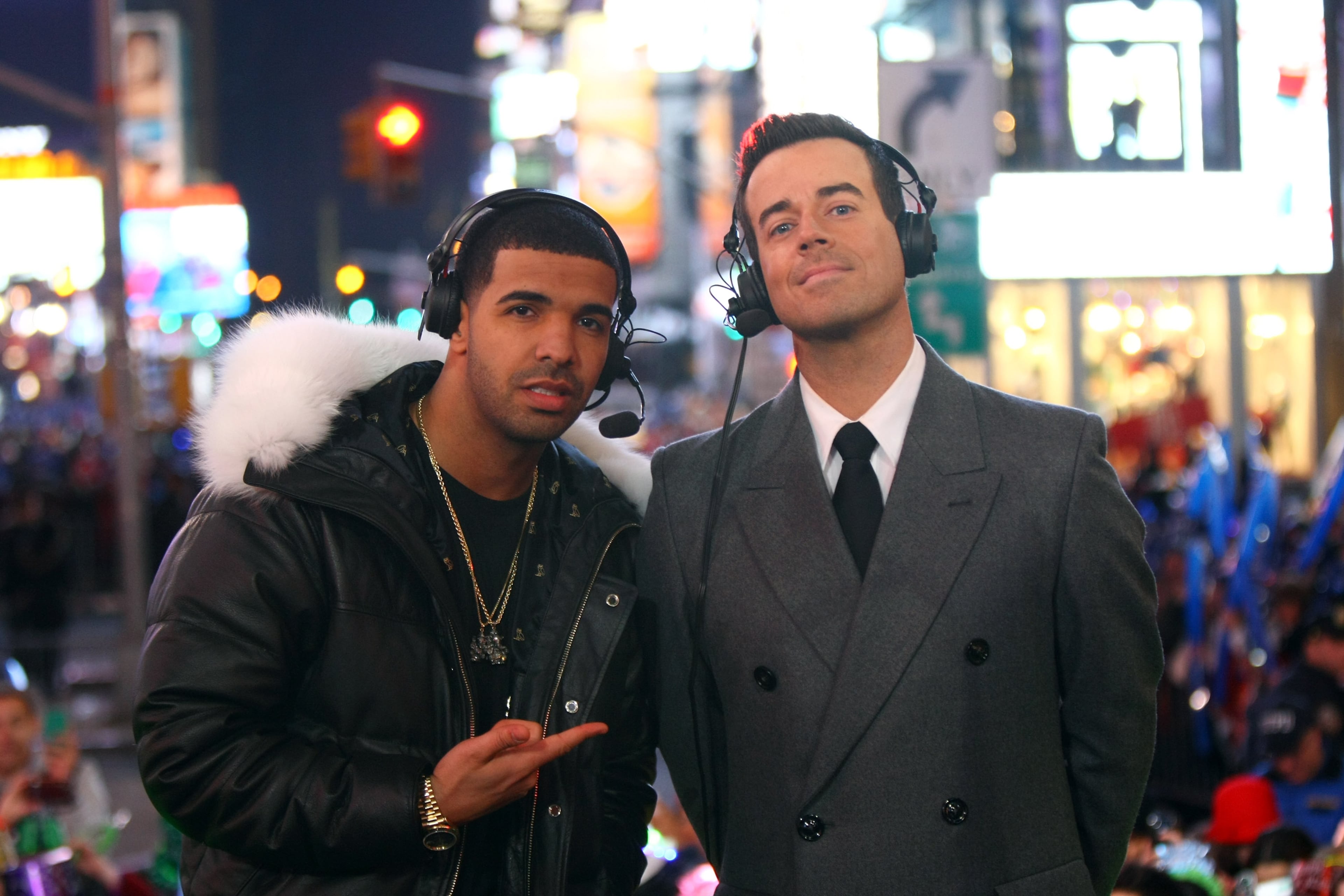 NEW YORK, NY - DECEMBER 31: Rapper Drake (L) and Carson Daley on stage during New Year's Eve 2012 With Carson Daly in Times Square on December 31, 2011 in New York City. (Photo by Neilson Barnard/Getty Images)