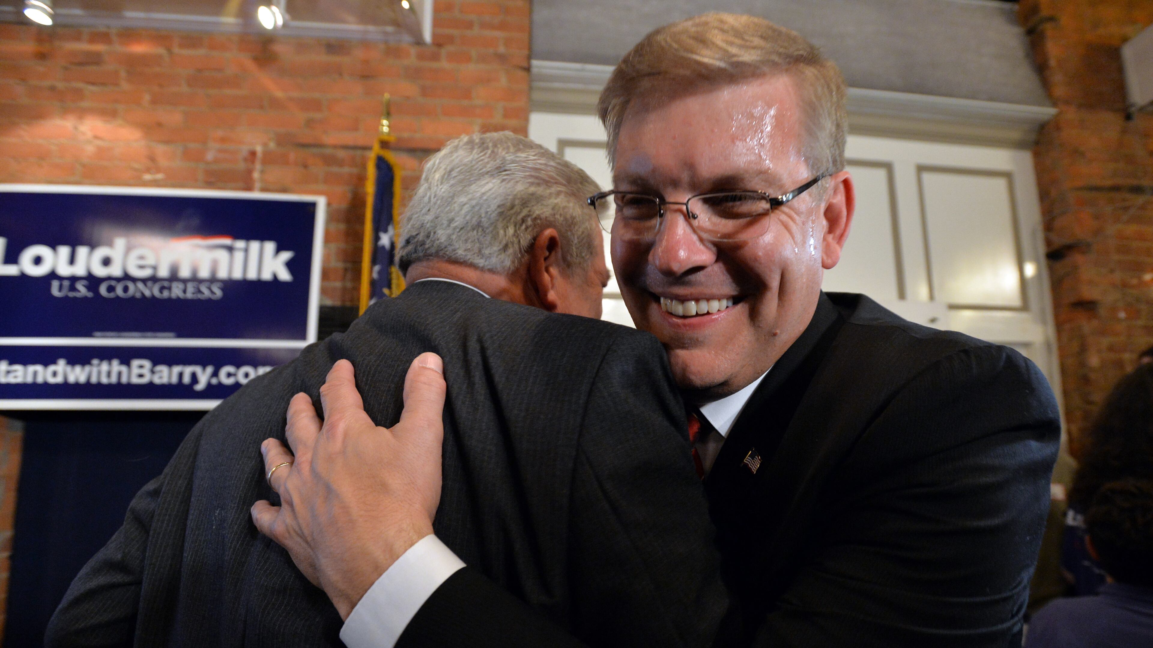 July 22, 2014 Acworth, GA: Barry Loudermilk celebrates with supporters after defeating Bob Barr in the 11th Congressional District runoff.BRANT SANDERLIN /BSANDERLIN@AJC.COM