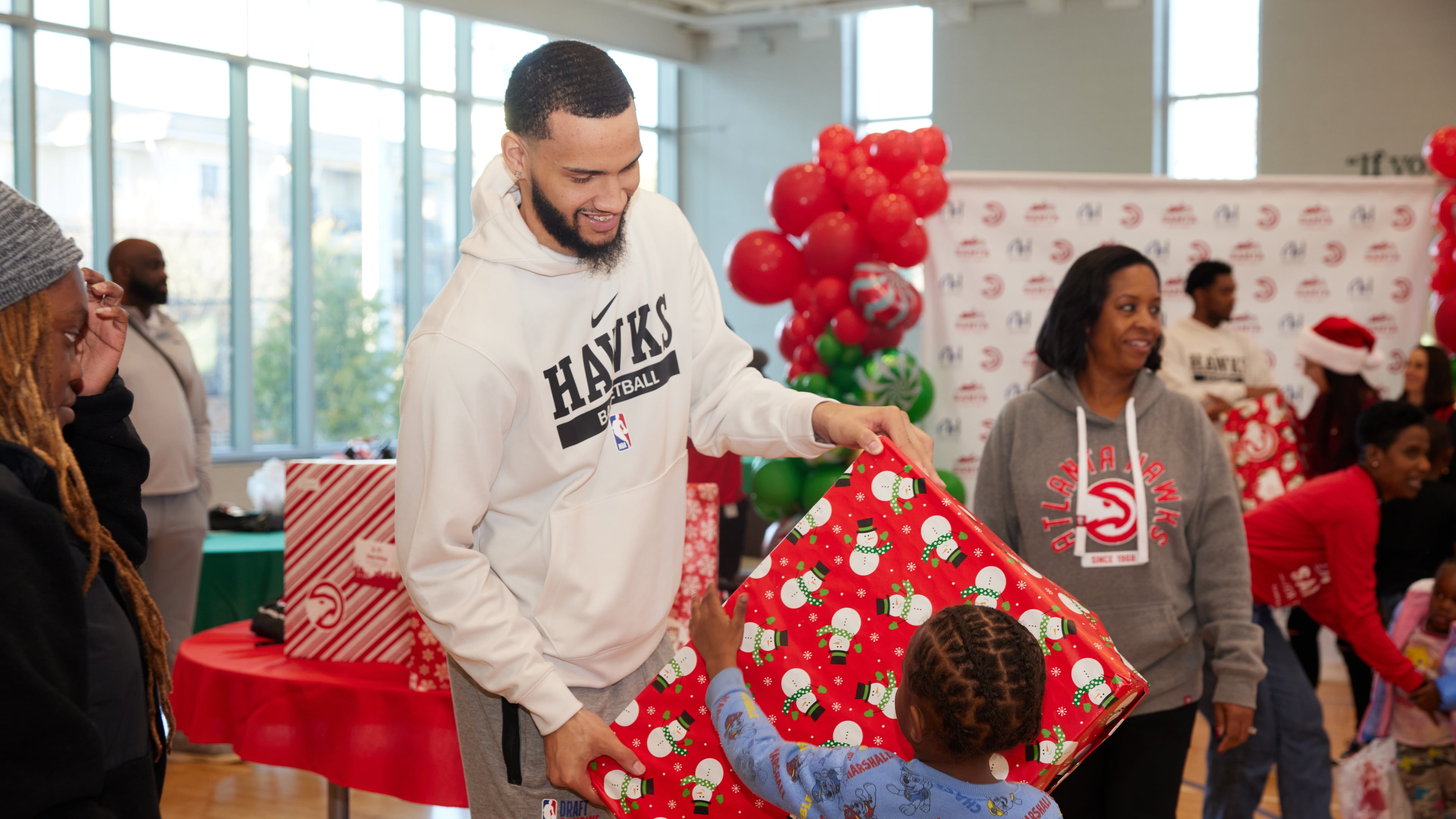 The Atlanta Hawks teamed up with Santa for a Day and Atlanta Housing, the largest public housing authority in Georgia, to provide 60 underserved youth with gifts in advance of the holidays.