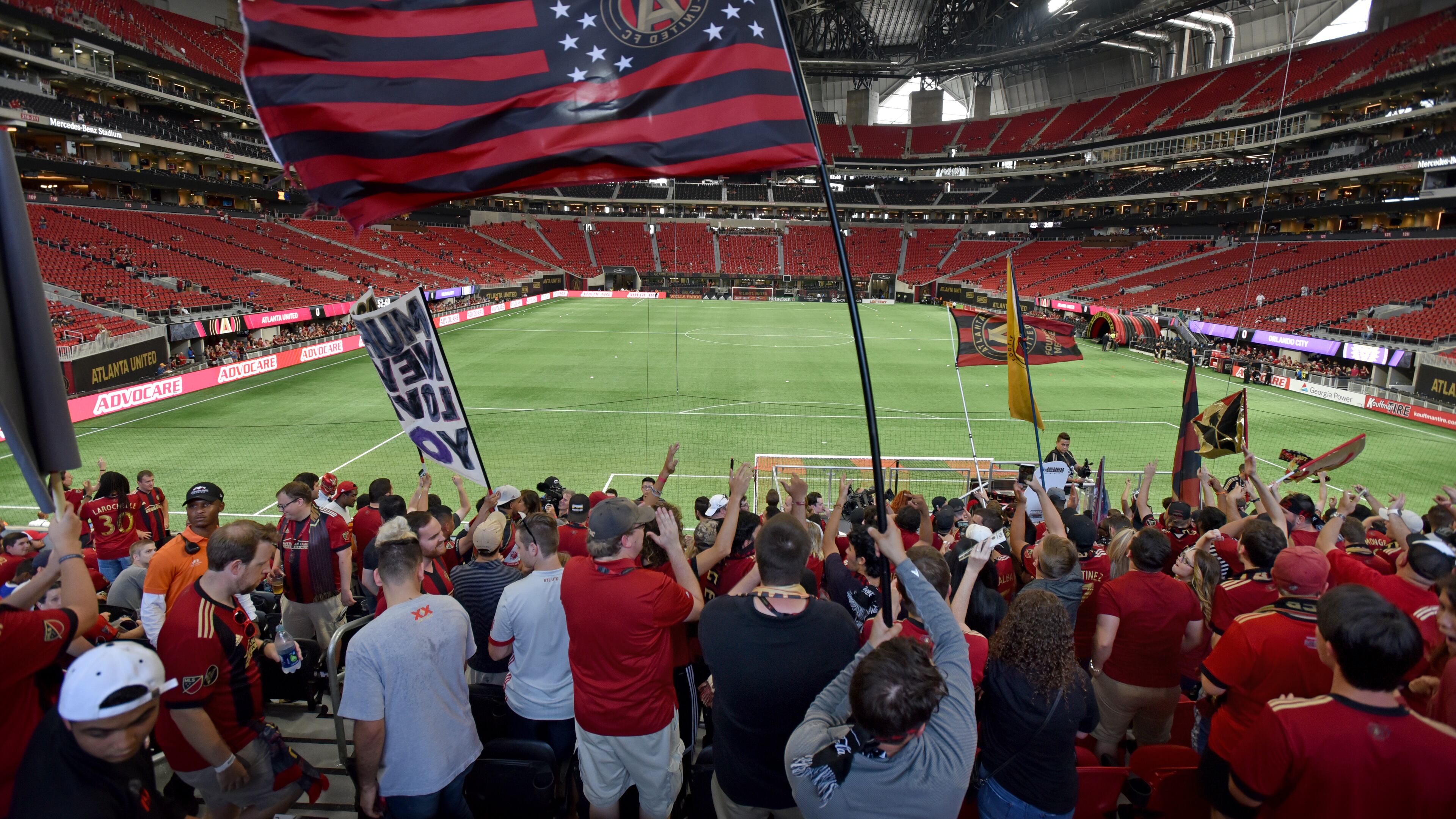 September 16, 2017 Atlanta - Atlanta United fans cheer before an MLS soccer match at Mercedes-Benz Stadium on Saturday, September 16, 2017. Saturdayâs Atlanta United match against Orlando City will be the third at Mercedes-Benz for the first-year franchise, and a new Major League Soccer single-game attendance record is expected to be set in the latest meeting of the southern MLS rivals. HYOSUB SHIN / HSHIN@AJC.COM