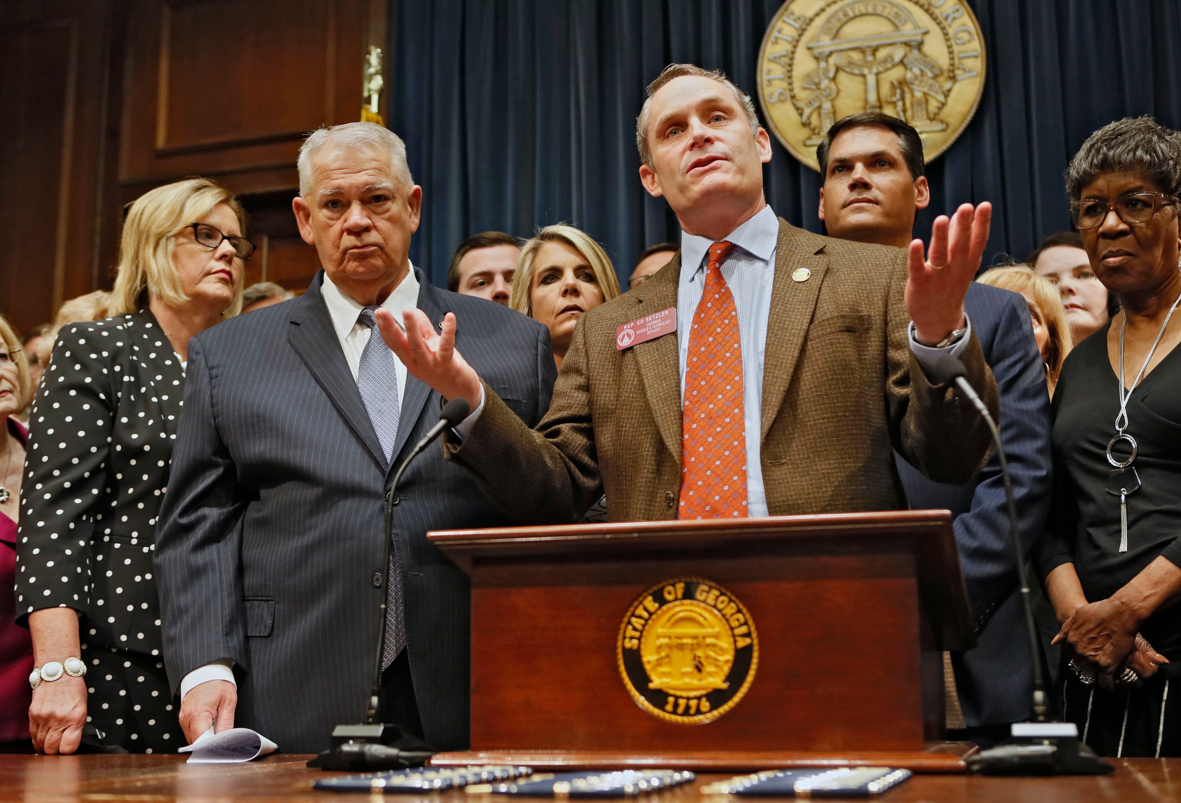 May 7, 2019 - Atlanta - Rep. Ed Setzler, R - Acworth, surrounded by supporters of the bill, including Sen. Renee Unterman (from left), R - Buford, House Speaker David Ralston, and Lt. Gov. Geoff Duncan, speaks before the signing. Gov. Brian Kemp signed HB 481, the "heartbeat bill", on Tuesday, setting the stage for a legal battle as the state attempts to outlaw most abortions after about six weeks of pregnancy. The bill, sponsored by Rep. Ed Setlzer, R-Acworth, and carried in the Senate by Sen. Renee Unterman, R - Buford, outlaws most abortions once a doctor can detect a fetus' heartbeat - usually around six weeks of pregnancy. Bob Andres / bandres@ajc.com